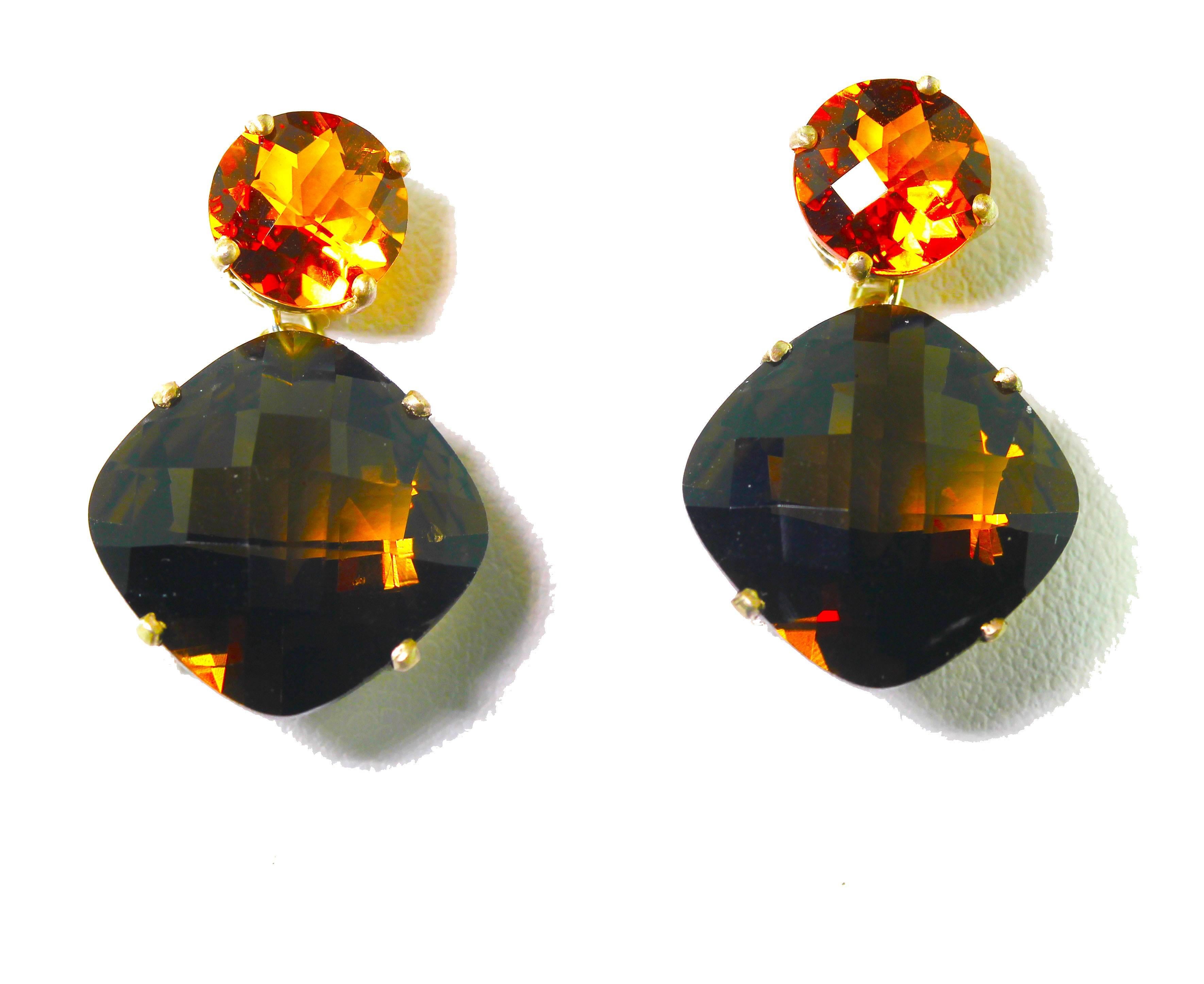 Round 1.48 carats each Madagascar Citrine (8 mm) dangle these exquisite sparkling 9 carats each of checkerboard Smoky Quartz (14 mm x 14 mm) set in sterling silver stud earrings.  They measure 1 inch long. 