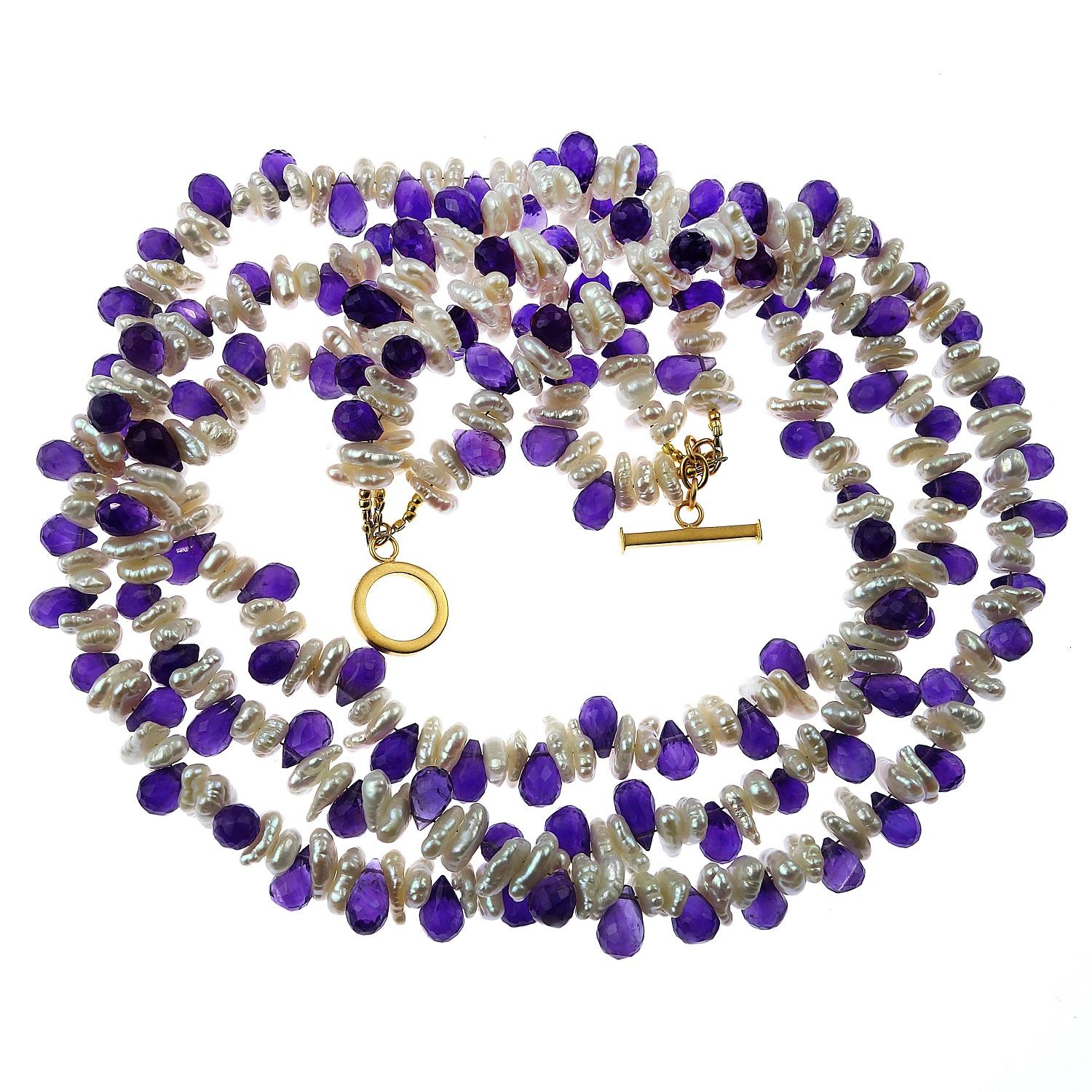 Custom made sparkling Amethyst Briolettes alternating with lustrous White Keshi Pearls necklace. These three strands will sit loosely on top of each other or can be twisted to create more of a choker. The total length of the necklace is 17.5 inches