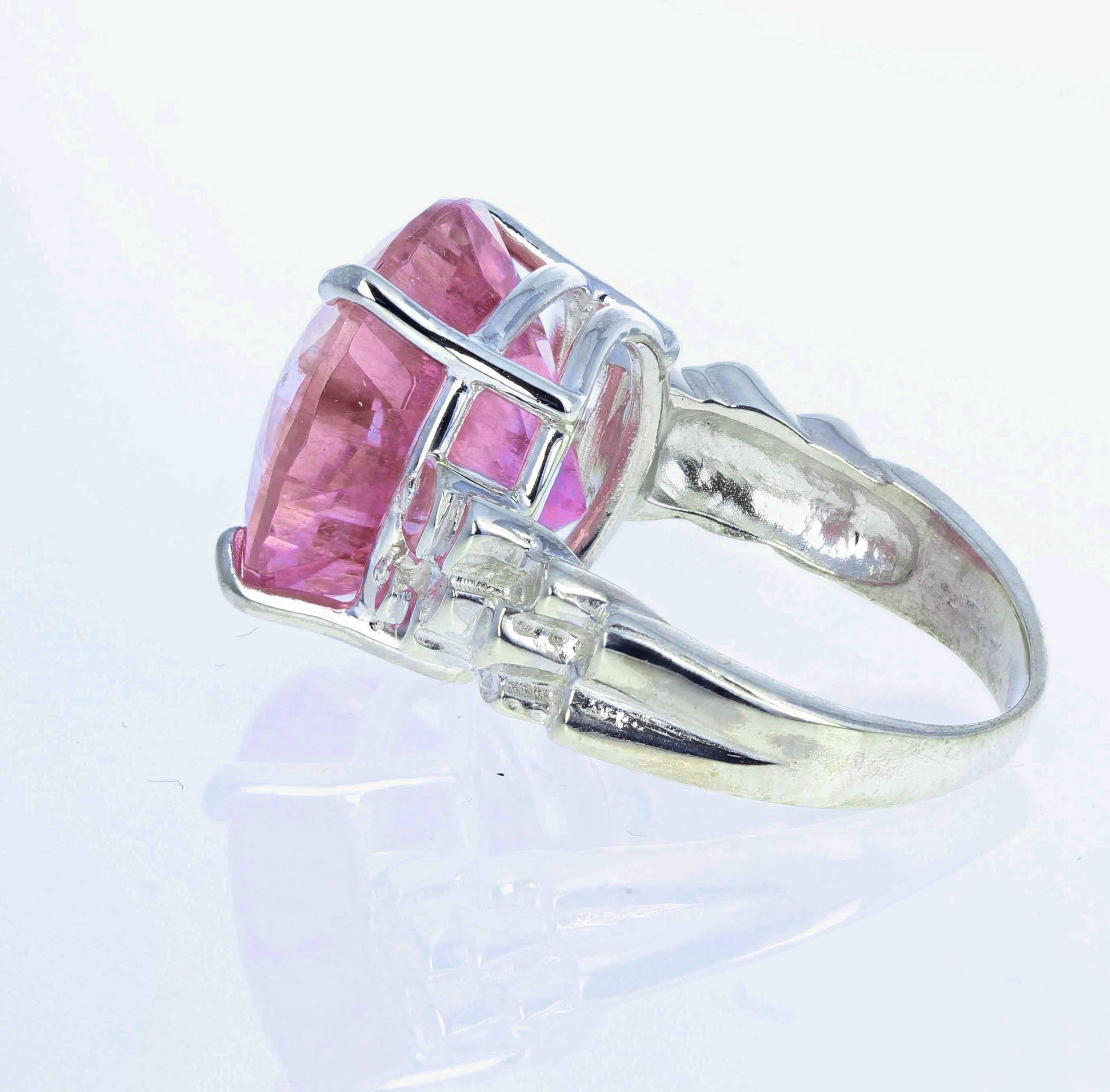 Gorgeous brilliant pinky natural 13.5 Carat Brazilian Kunzite (14.7 mm) set in a sterling silver ring size 6 (sizable) Spectacular optical effect in the Kunzite exhibits glitteringt reflections and firey highlights.    