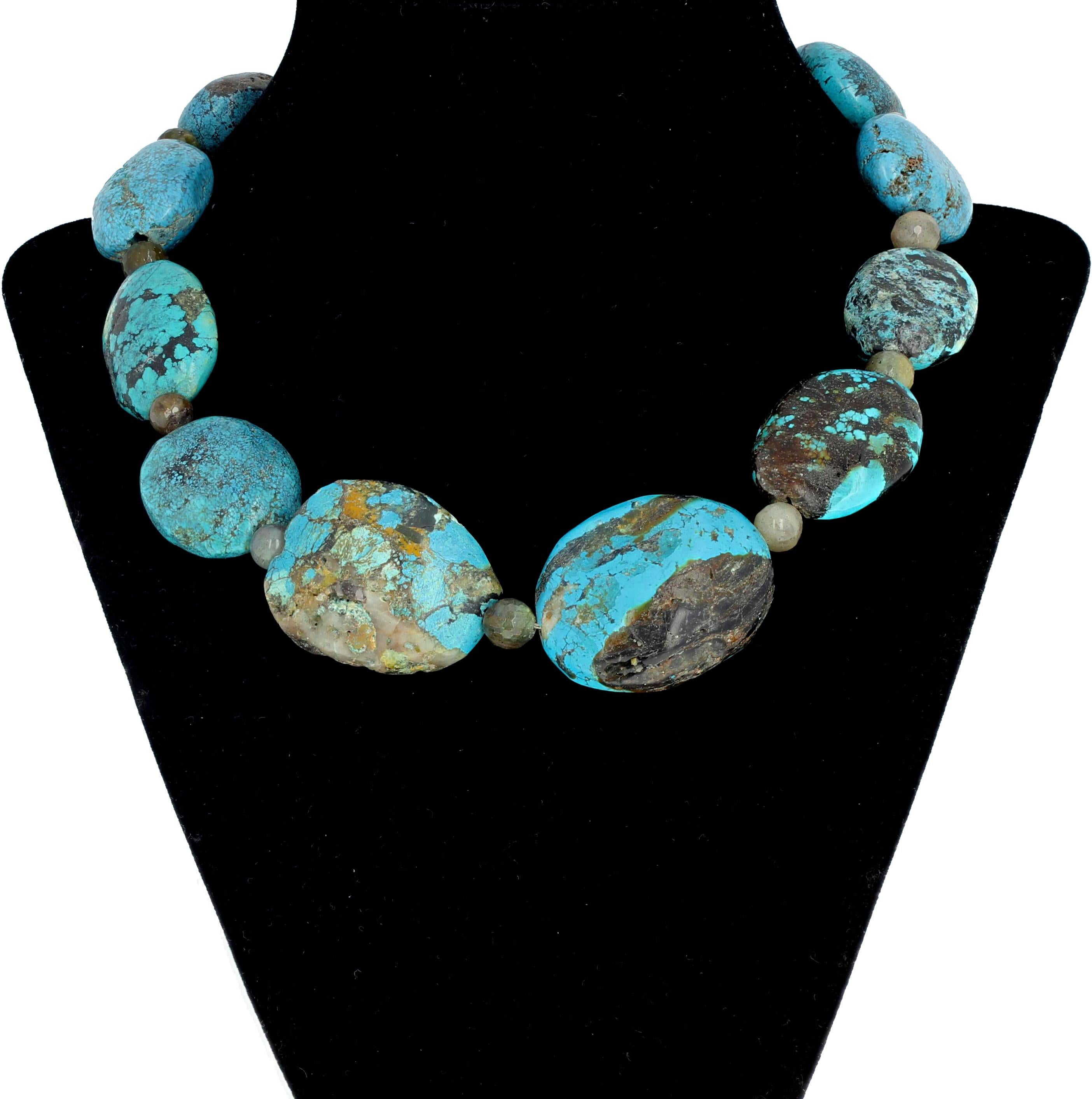 Polished chunks of natural rare Yai Turquoise rocks enhanced with checkerboard cut gemmy Mexican Labradorite spacers. This measures 17 inches long and the clasp is silver tone hook.  There are pictures of both sides of the necklace attached here. 