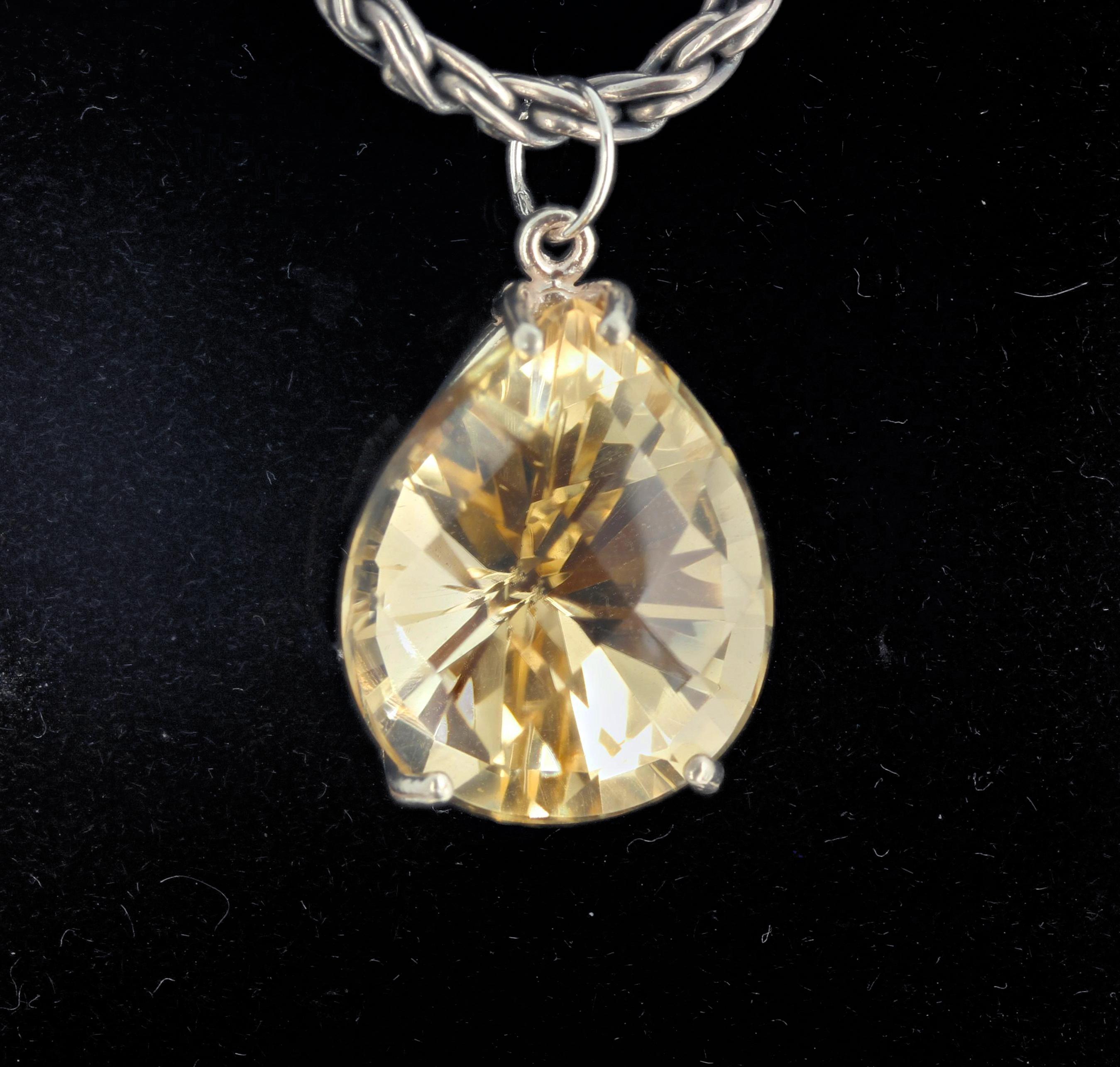 Brilliant checkerboard gem cut tear drop Lemon Quartz (19.3 mm x 15.5 mm) sterling silver pendant.   This hangs approximately 1 inch long.  