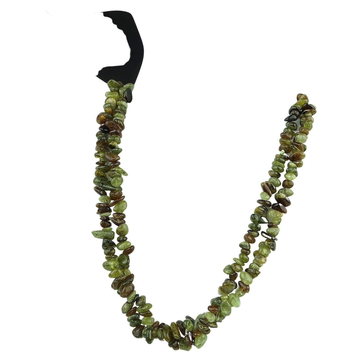 33 Inch continuous strand of high polished Green Garnet chip necklace. This unique necklace comes from one of our favorite suppliers in Sao Paulo. It is so versatile, wear it long as one 33 inch strand. Or, double it and clip with either of the gold