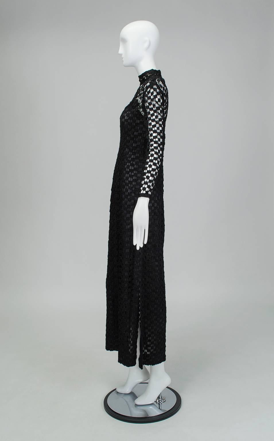 Nearly identical to the louche white crochet maxi dress made famous by Jane Birkin, this frock is both a little bit hippie and a little bit rock and roll. The banded neckline and columnar silhouette belong to the beau monde, but the crochet keeps it
