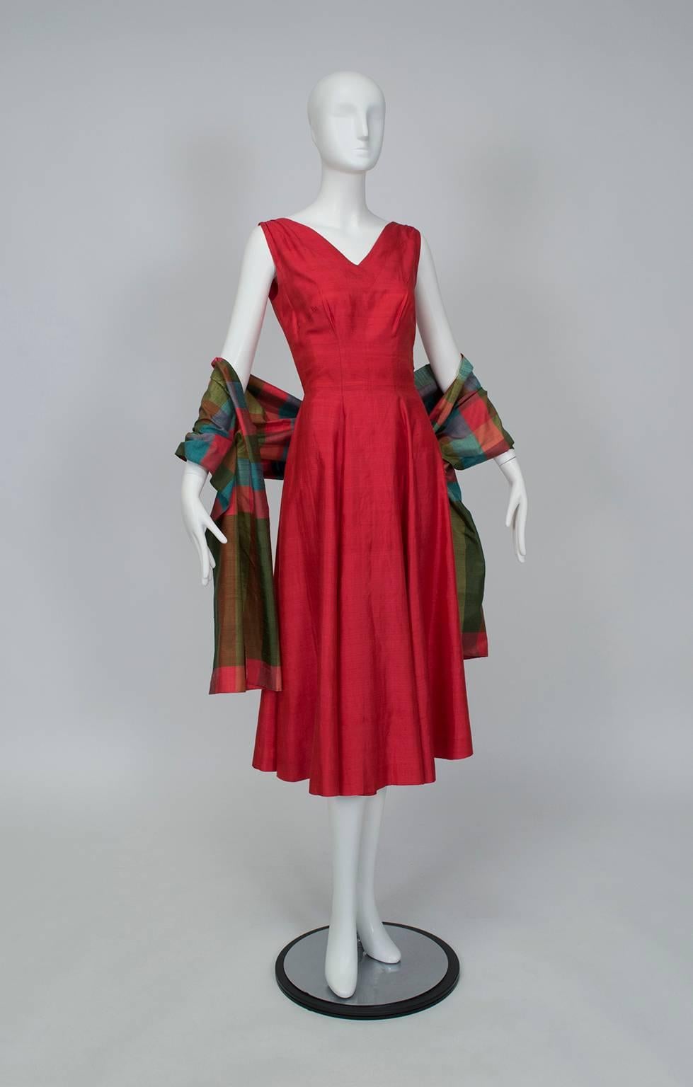 From the estate of a WWII nurse who traveled Asia (alone!) during her leave, this exceptional dress was custom made in Bangkok in the early 1950s. Though it appears straightforward, the dress features subtle details like alternating textile grains