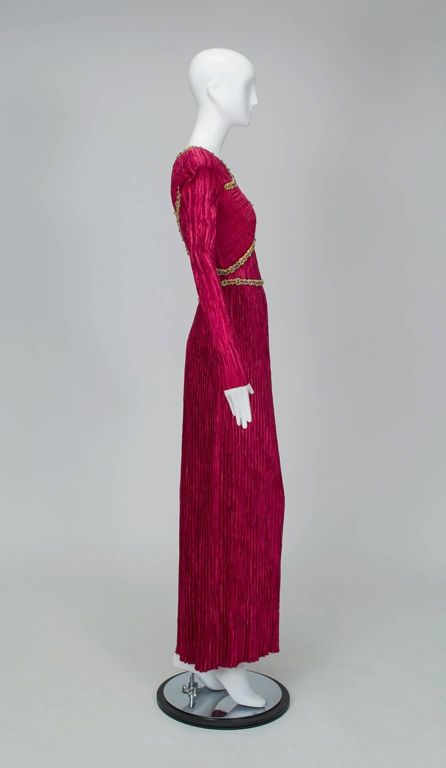 “Modesty, what elegance!” said Coco Chanel. McFadden reiterates with a statuesque gown that evokes Greek goddess-like femininity but reveals nothing except a keyhole in the center back. And the color? Like ripe red raspberries: delicious!

Long