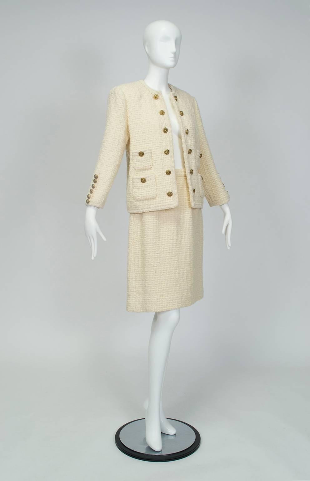 Though a facsimile of the real thing, this extraordinary (and extraordinarily heavy!) skirt suit is a dead-ringer for one of the 