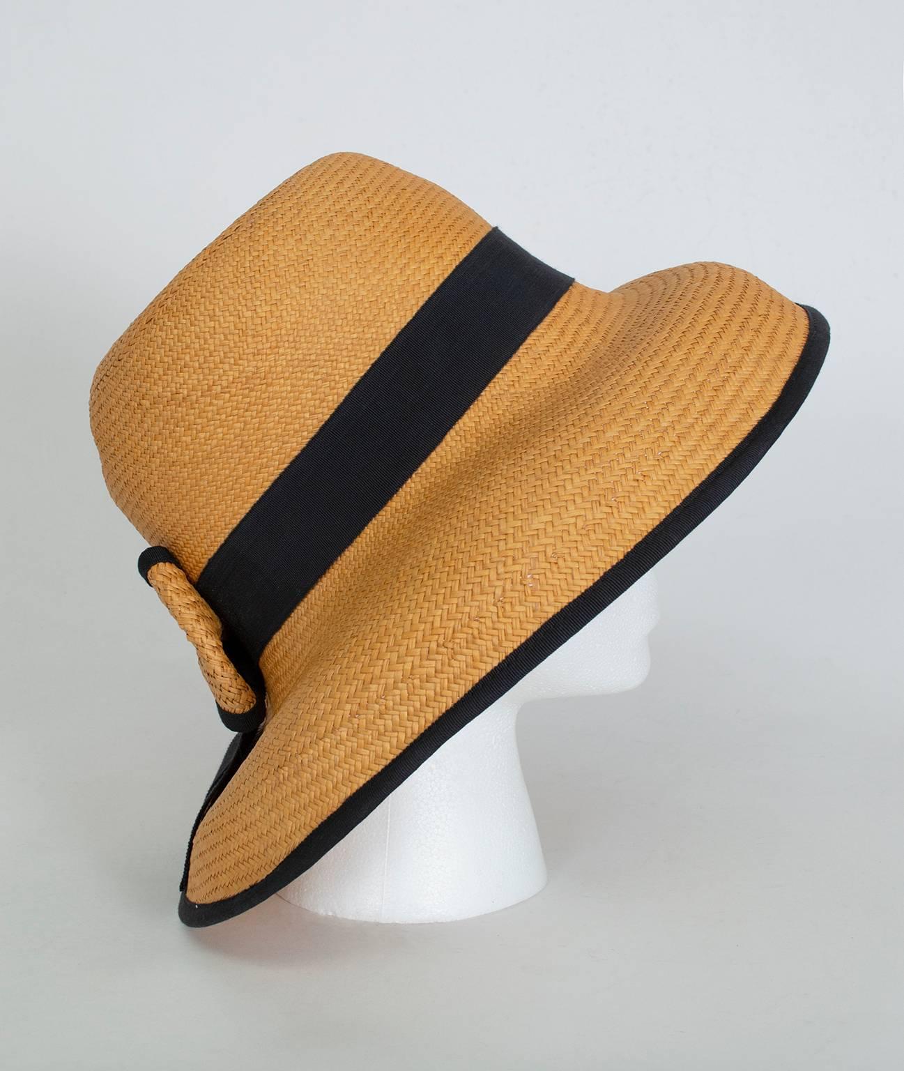 Breezy but still polished, bucket hats are a chic way to complete an outfit, frame your face and avoid UV radiation. We love the sportiness that the black grosgrain trim imparts to this beautiful example...right down to the rear straw bow!

Straw