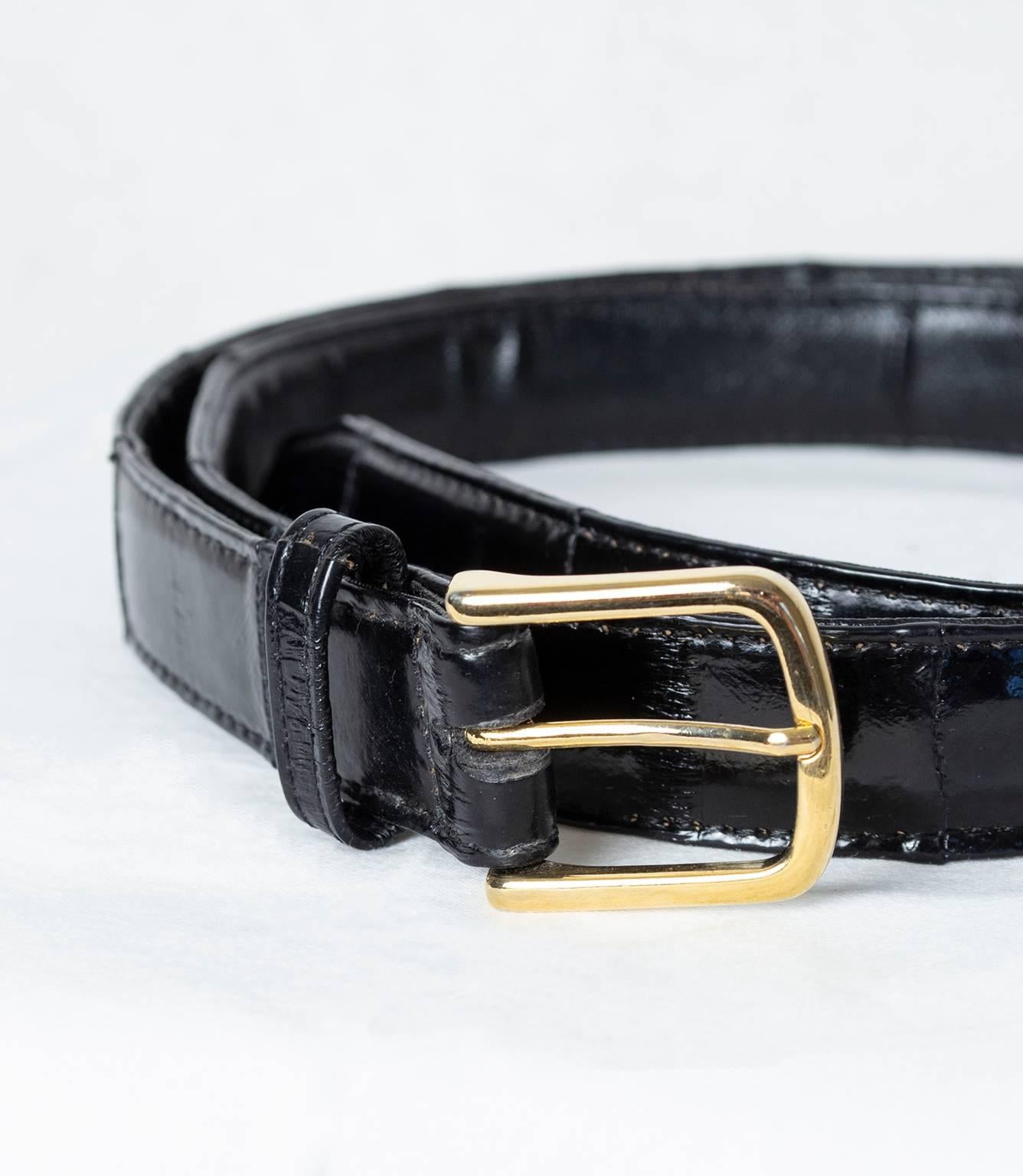 A sophisticated alternative to alligator, quality eelskin has the same shine and luster as its reptilian counterpart, but a less textured relief. In basic black with an understated slim gold buckle, this one lets the unique leather do all the