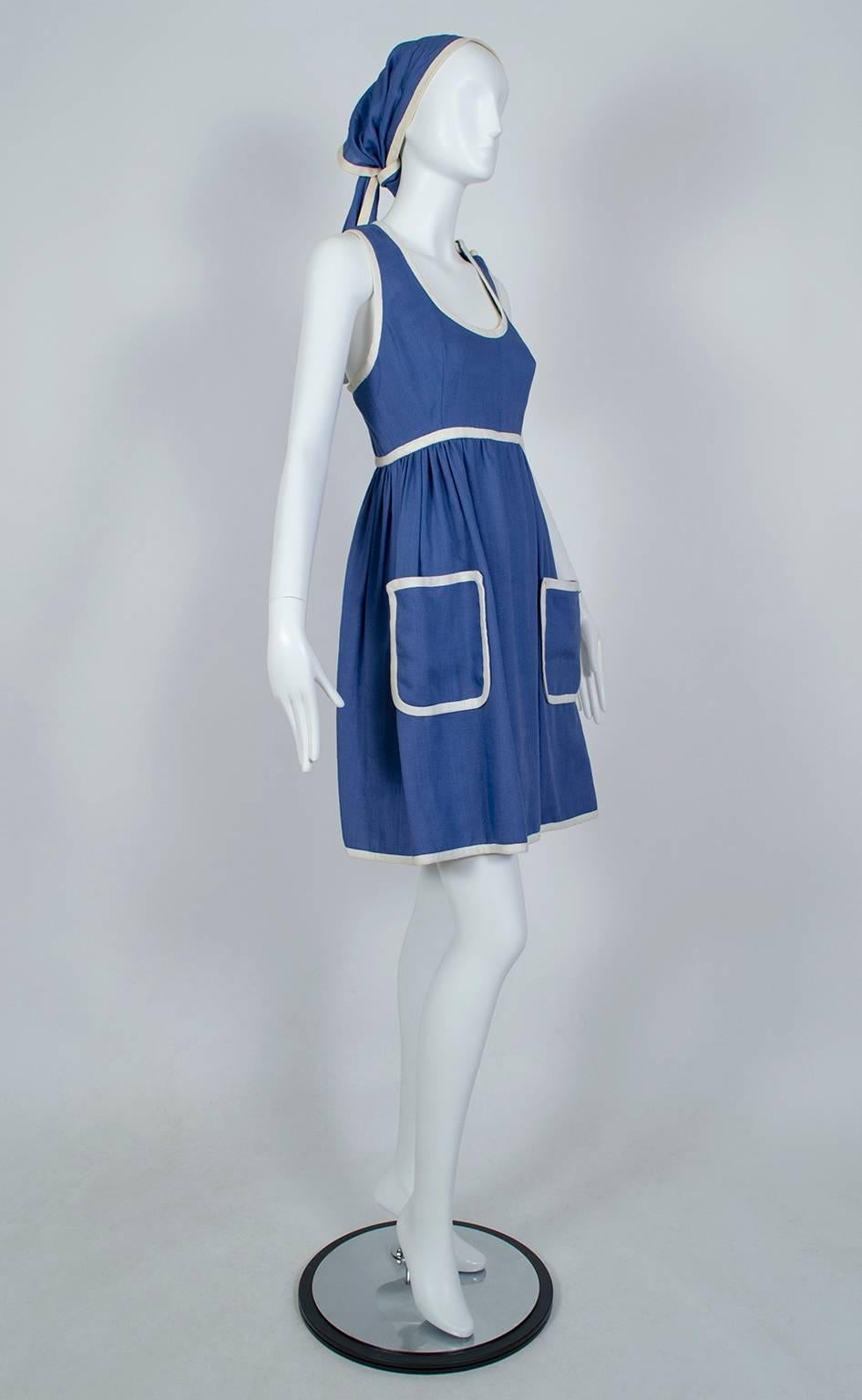 Ein tadelloses Kleid, das die Kluft zwischen den Generationen der 1960er Jahre überbrückt. Einerseits erinnern die kontrastfarbenen Paspeln, die Liebe zum Detail und der passende Schal an Jackie Kennedys makellosen Stil der frühen 60er Jahre,