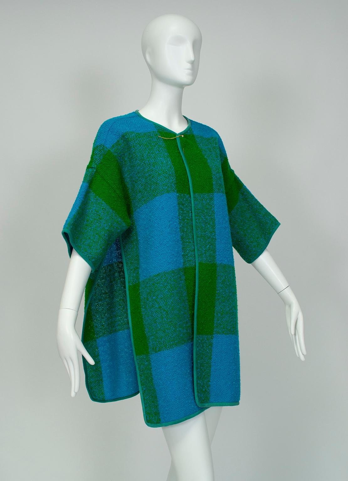 Part of the permanent collection at the Metropolitan Museum of Art, this blanket coat is representative of the innovative, practical yet chic sportswear that earned Cashin her fame.  Little more than a simple T shape with open sides and her