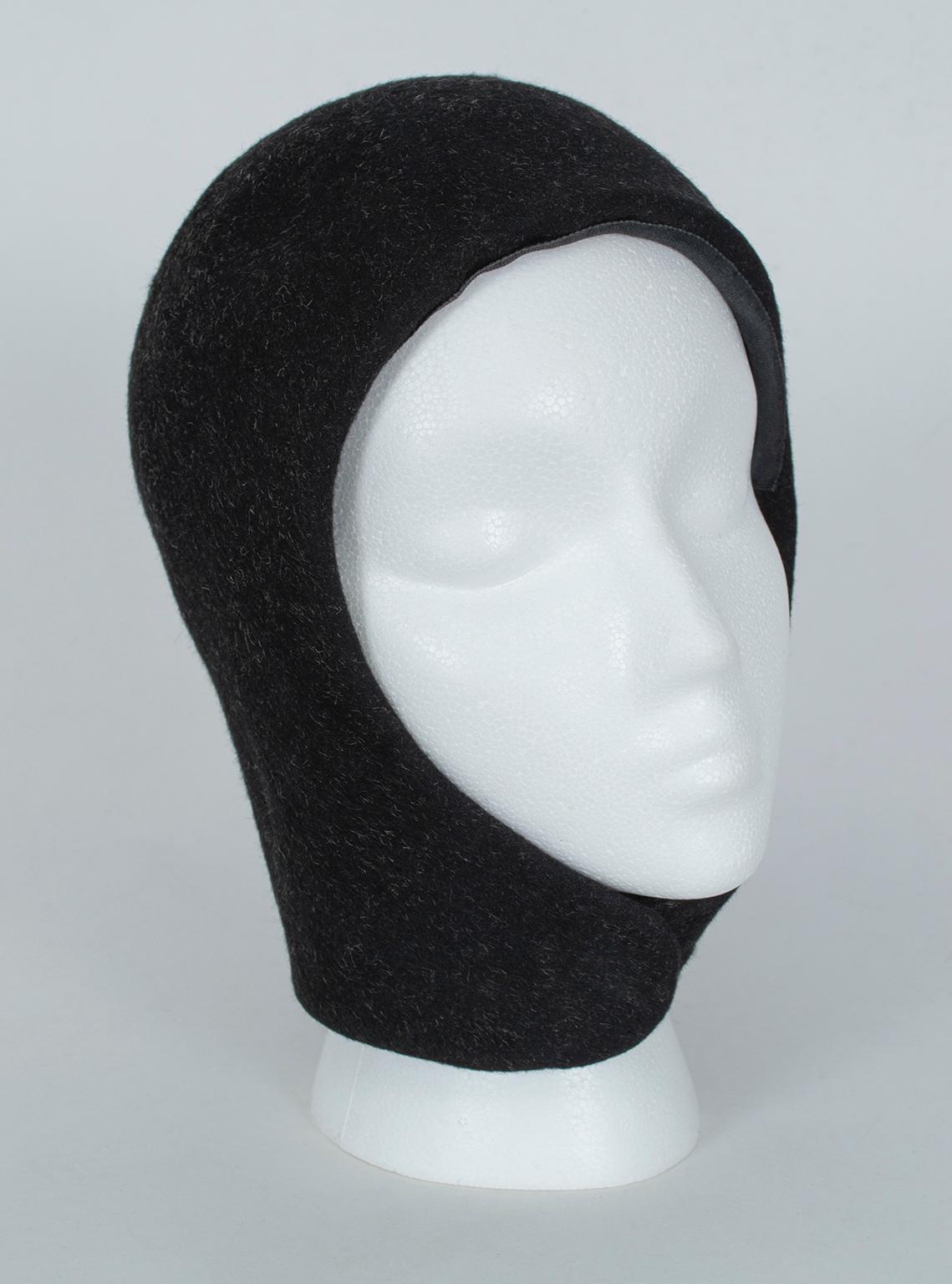 As chic and cool as it gets, this futuristic-looking balaclava is as fashionable now as the day it was made--possibly more so. Your solution for bad hair days, cold weather, or just shunning the world (worn with extra large sunglasses, of course)