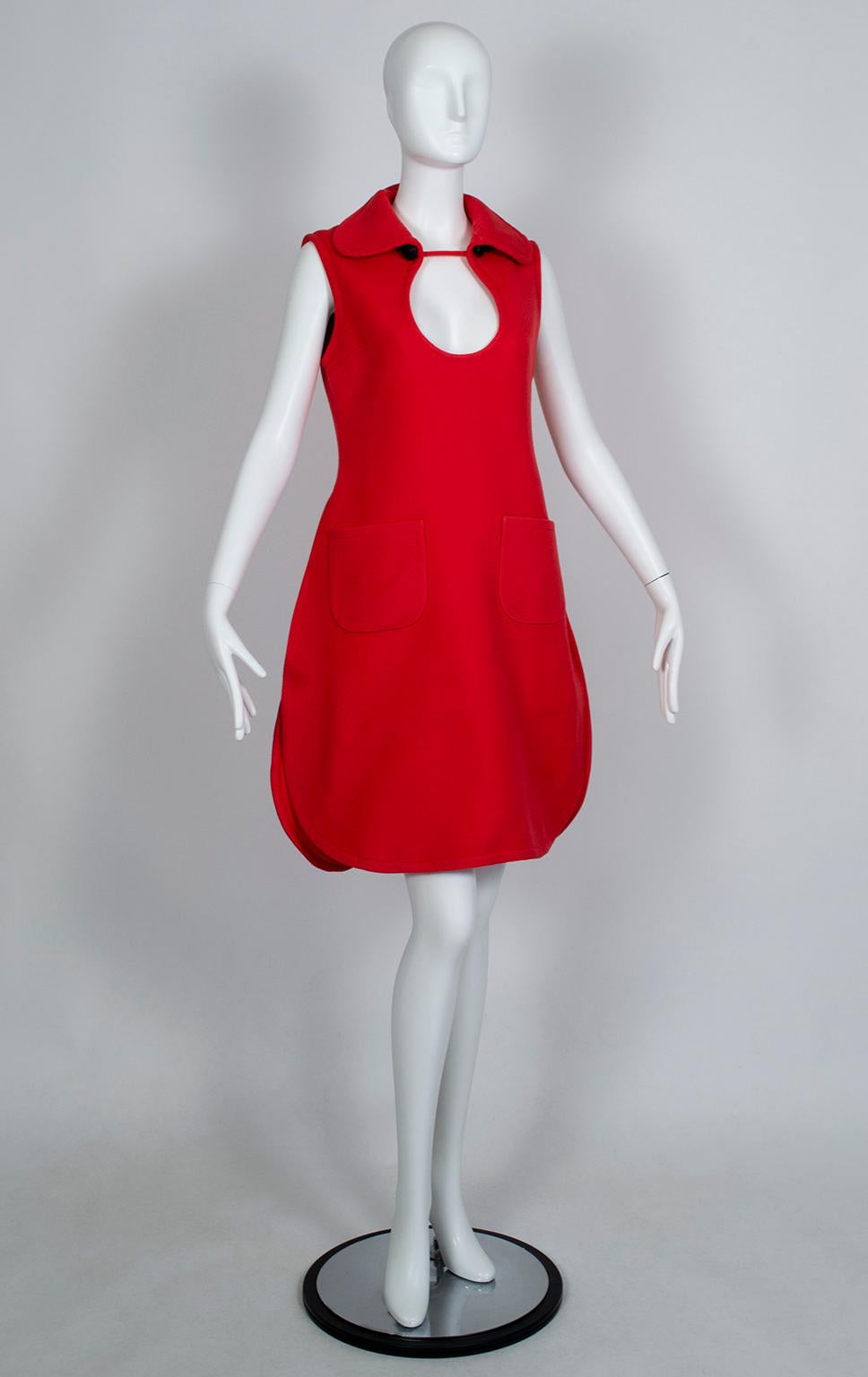 This tabard dress with its structured trapeze shape, curving teardrop hem and mid-chest cutout is an unlabeled prototype from one of Cardin’s late 60s collections. It was acquired from the London estate of Anne Dettmer, whose expansive fashion