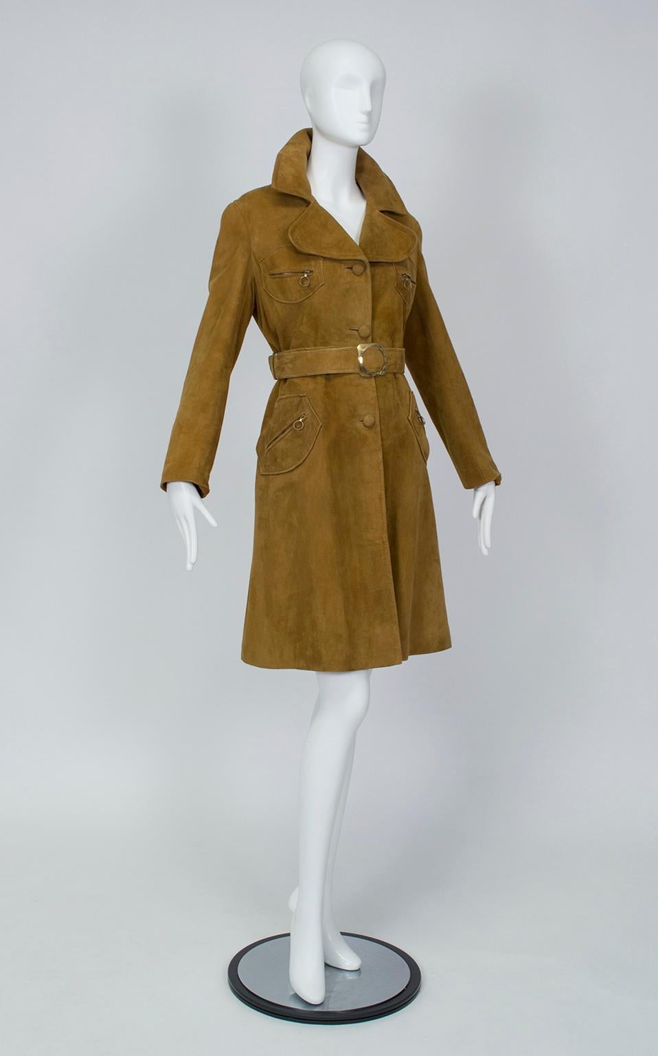With its Mod cutout brass buckle and zippered pockets (with round pull rings!), this coat will have you channeling Françoise Hardy in a New York (or Paris) minute. Pair with block heel boots, a floppy hat and an acoustic guitar for maximum