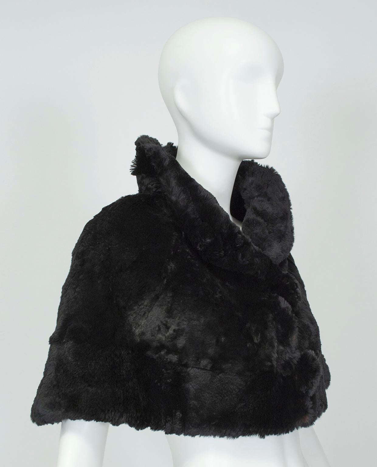 As timeless as a set of pearls, fur stoles evoke ladylike elegance and remain essential-wearing with strapless dresses. Though it is black, this one is anything but basic thanks to its tidy shawl collar, charming self trim and playful oversized pom