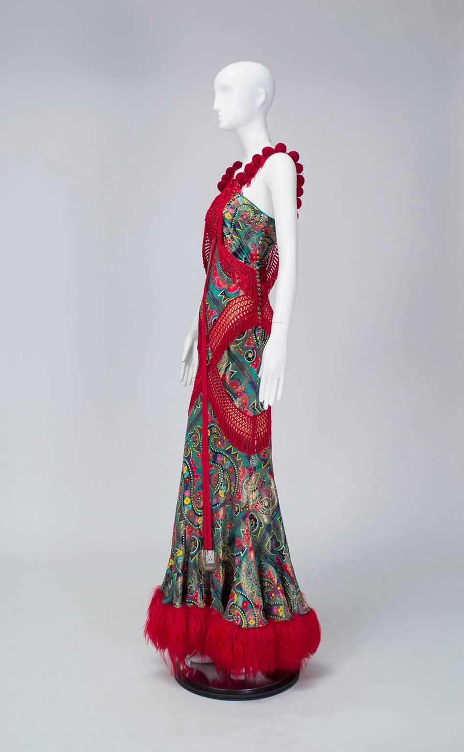 Part of Galliano's eponymous collection, this gown was worn on the runway by Alek Wek in 2002. A sculptural statement piece, it demonstrates Galliano's 