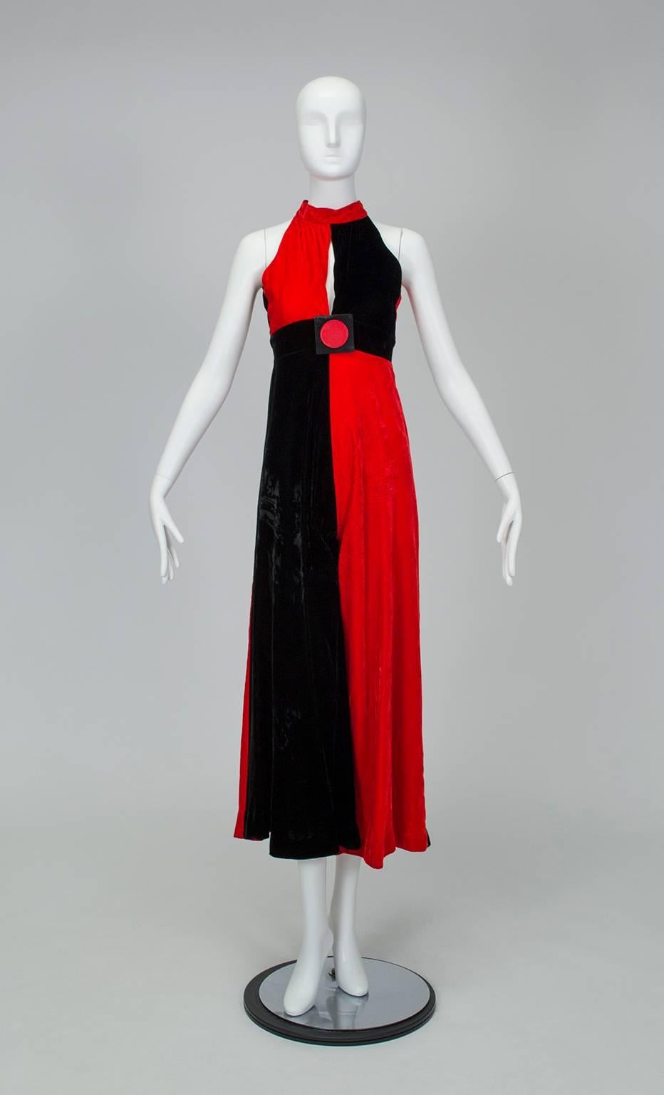 So right in its wrongness, this eye-popping jumpsuit belongs in Venice on a gondola during Carnivale. Though it has many attributes, its best feature is the giant red and black resin brooch at the sternum: Mod madness.

Backless halter-neck jumpsuit