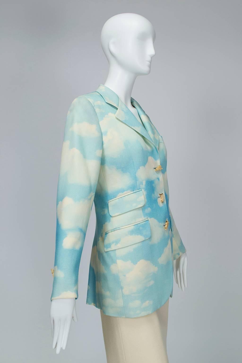 Perfect for wearing to an art gallery or simply to bring the outdoors inside, this jacket is covered in the cloudy blue sky pattern René Magritte featured in so many of his paintings; the carved angel buttons add a further celestial touch.

Vintage