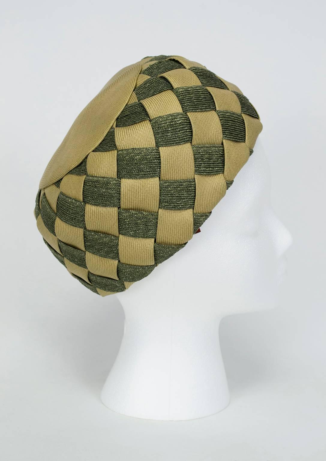 **Please note we will be out of the country April 24 - May 7, 2018 and unable to ship purchases until we return to our offices May 8.**

A perfect pillbox basket woven in two shades of green to create a checkerboard pattern; it even has interior