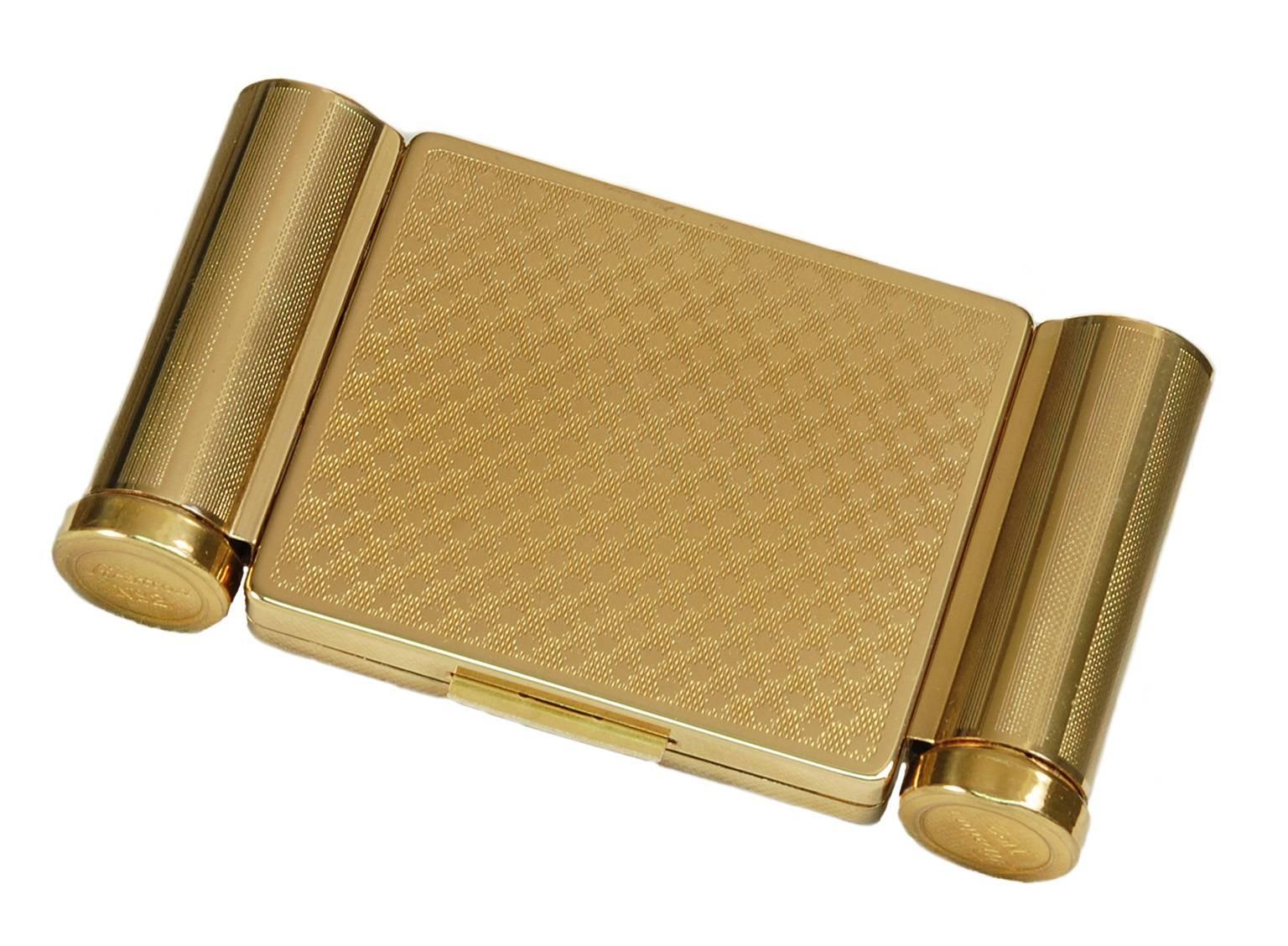 The ultimate in superluxe bygone glamour: a never-used, perfectly-preserved Stratton compact with a loose powder (or cash) well, lipstick case and perfume dauber in a package no larger than a cell phone. A refined way to keep everything you need
