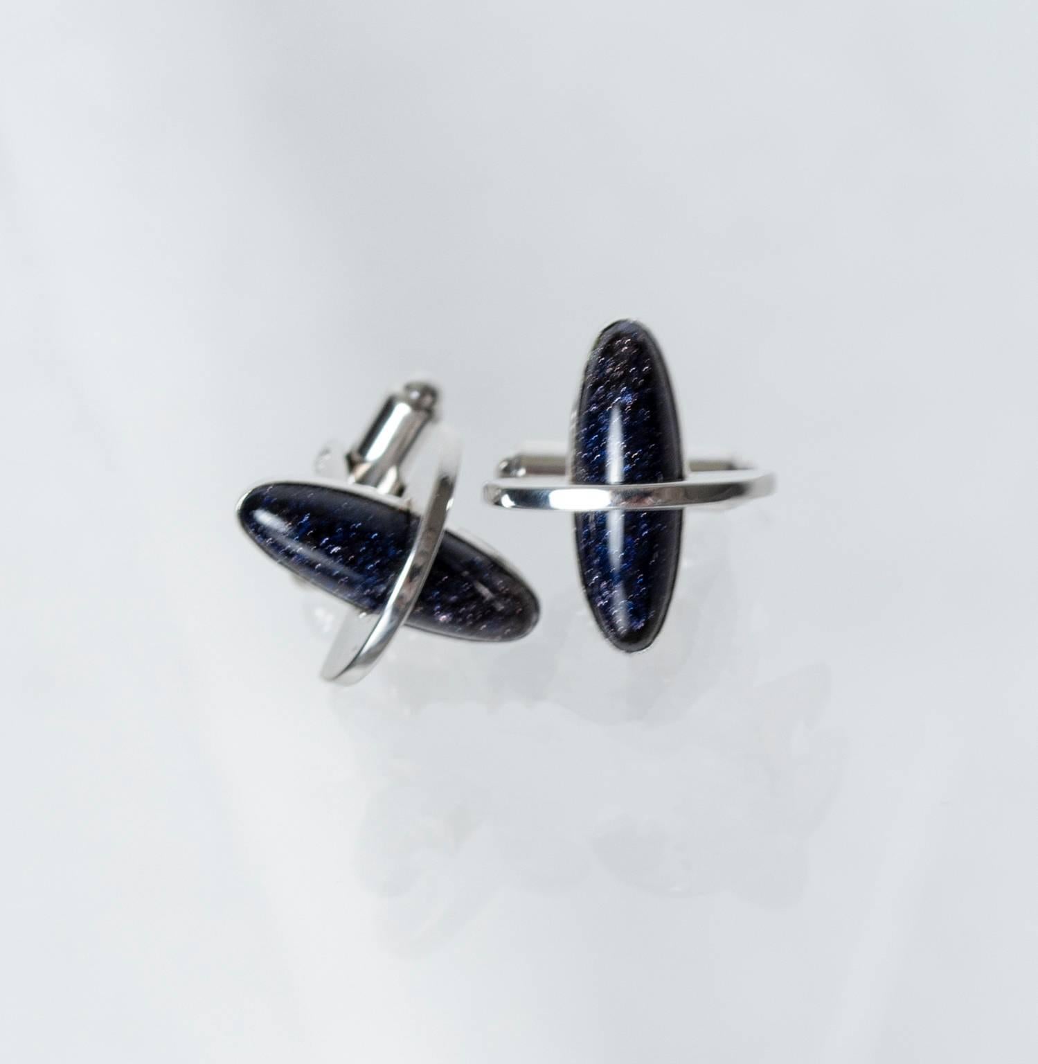 The perfect accompaniment to your slim-lapel suits and skinny ties, these iconic cuff links are the sartorial equivalent of a 2-martini lunch. Neither blue nor black but a combination of both, their most compelling feature is their subtle sparkle: