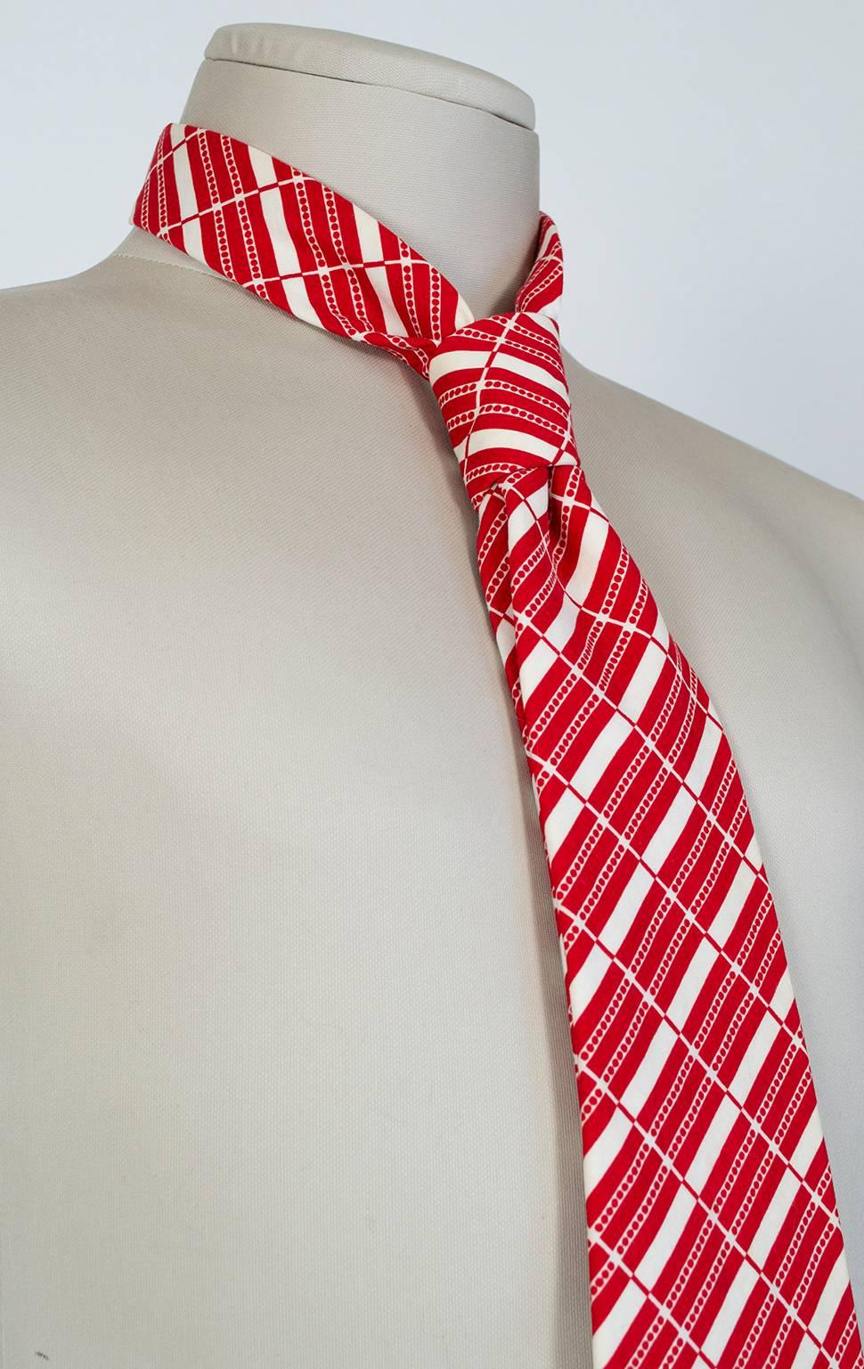 Crisp and nautical, this eye-catching tie brings modern playfulness to any ensemble. Made even cooler by its use of cotton poplin instead of the usual silk.

Red and white stripe and polka dot graphic print tie.


fabric: cotton poplin
noteworthy: 