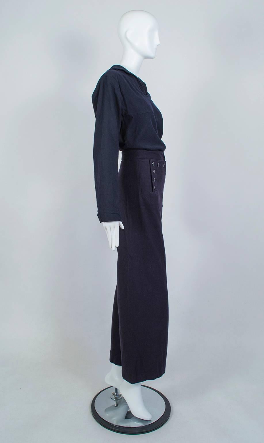 The ultimate “borrowed from the boys” ensemble, the US Navy crackerjack—with its wide-legged pants and pullover jumper—ironically seems better suited to a woman’s curves than the male body. This one has the added benefit of having belonged to a Navy