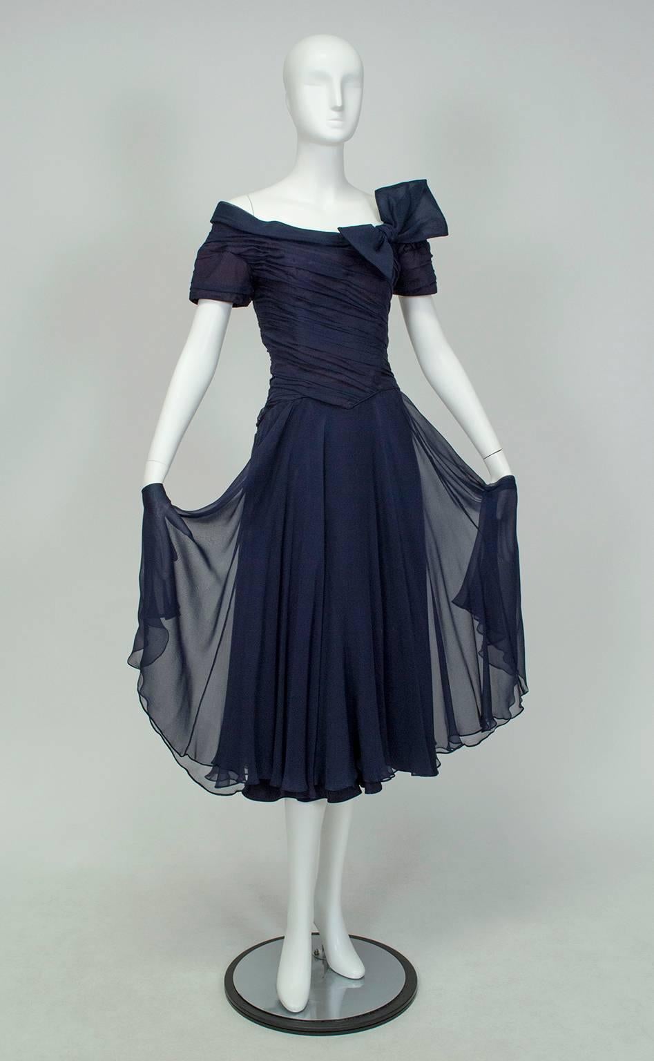 One look at this dress’s multidirectional bodice draping and it’s easy to see why seven of Chapman’s designs are featured in the Met’s permanent collection; the 35 feet of skirt justify comparisons to Christian Dior.  The kind of dress that should