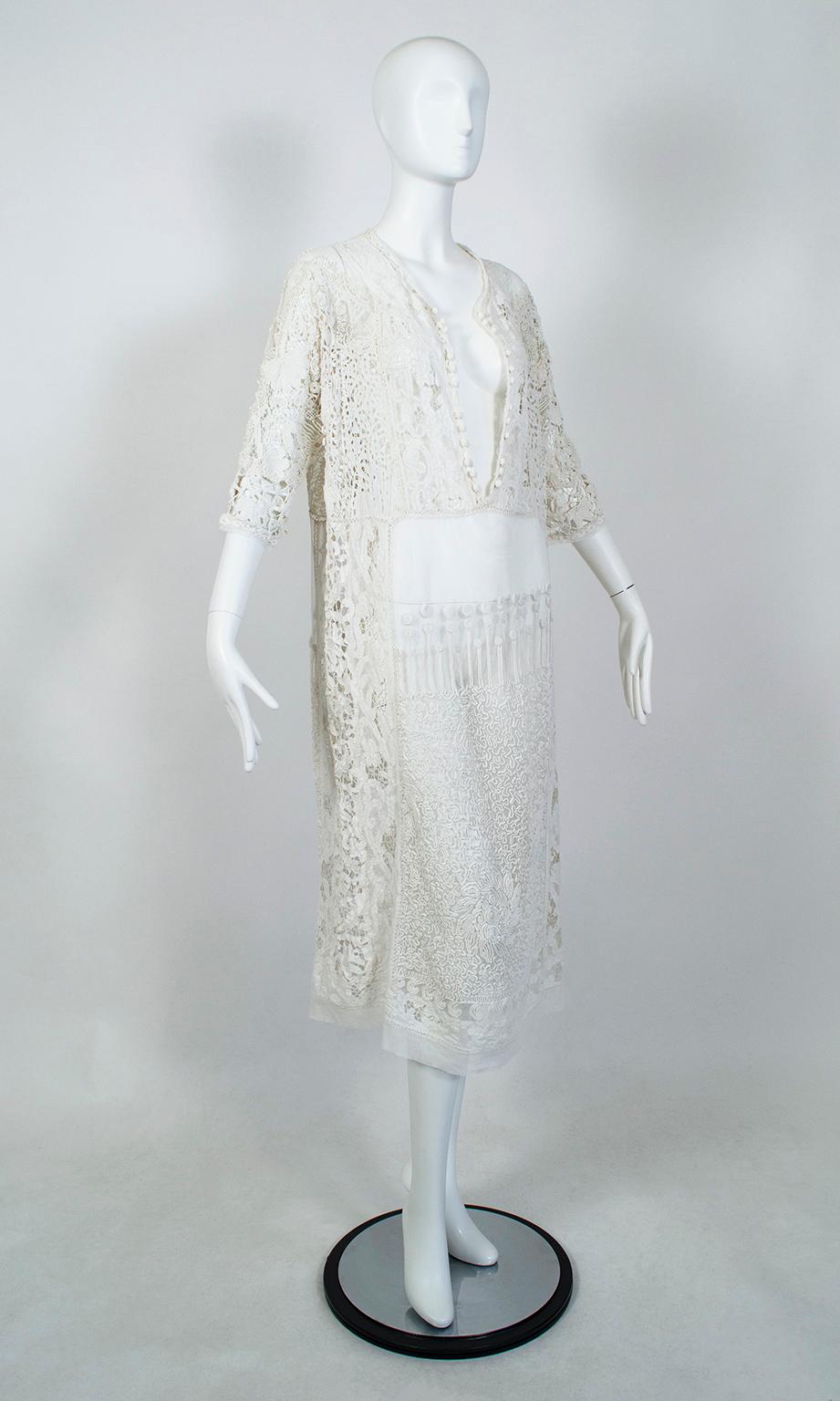 Astonishing for its waist-deep neck plunge, this Victorian-era kaftan would make an equally devastating dressing gown, bathing suit cover-up or even Bohemian wedding dress. Dripping with the details for which the Victorians were famous: net,