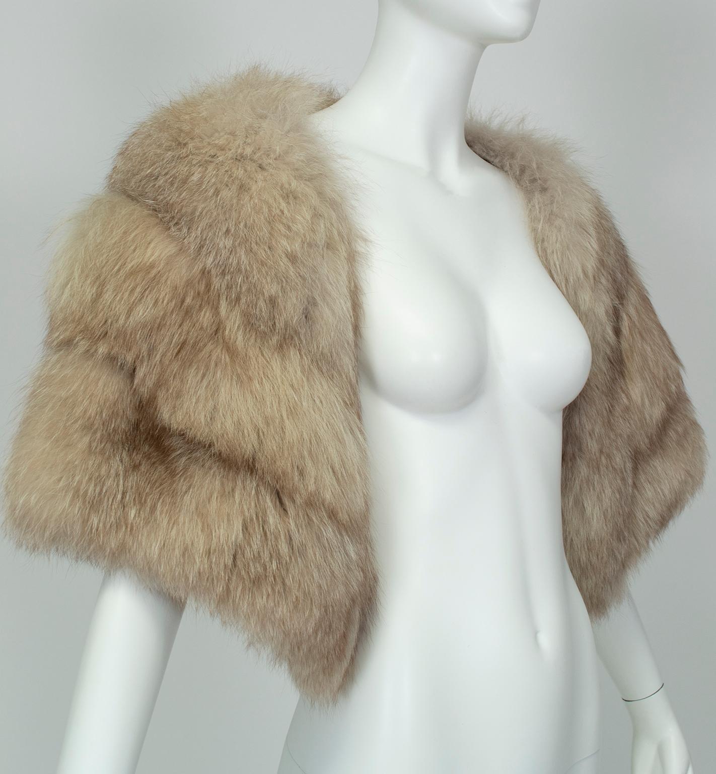 As timeless as a set of pearls, fur stoles convey ladylike elegance and remain essential-wearing with strapless dresses. In addition to its hard-to-find lighter color, this fox version offers absurdly high loft for a luxurious eyelash effect. It