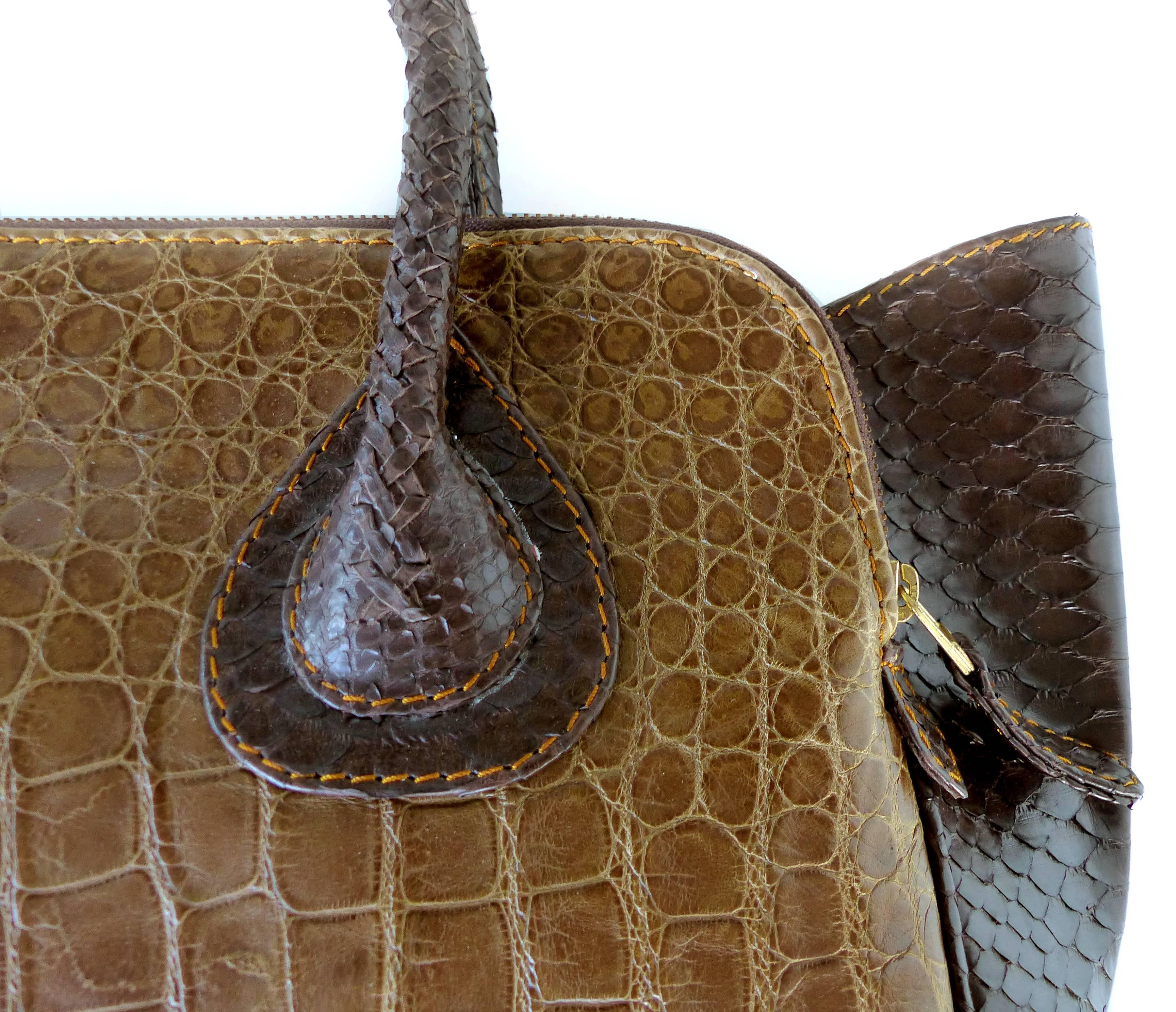 
Offered for sale is the large size of the "It" bag in tobacco colored salt water crocodile and chocolate rubberized python by Glen Arthur designs for GaBag Co. This wonderful bag is has three interior compartments. The side interior