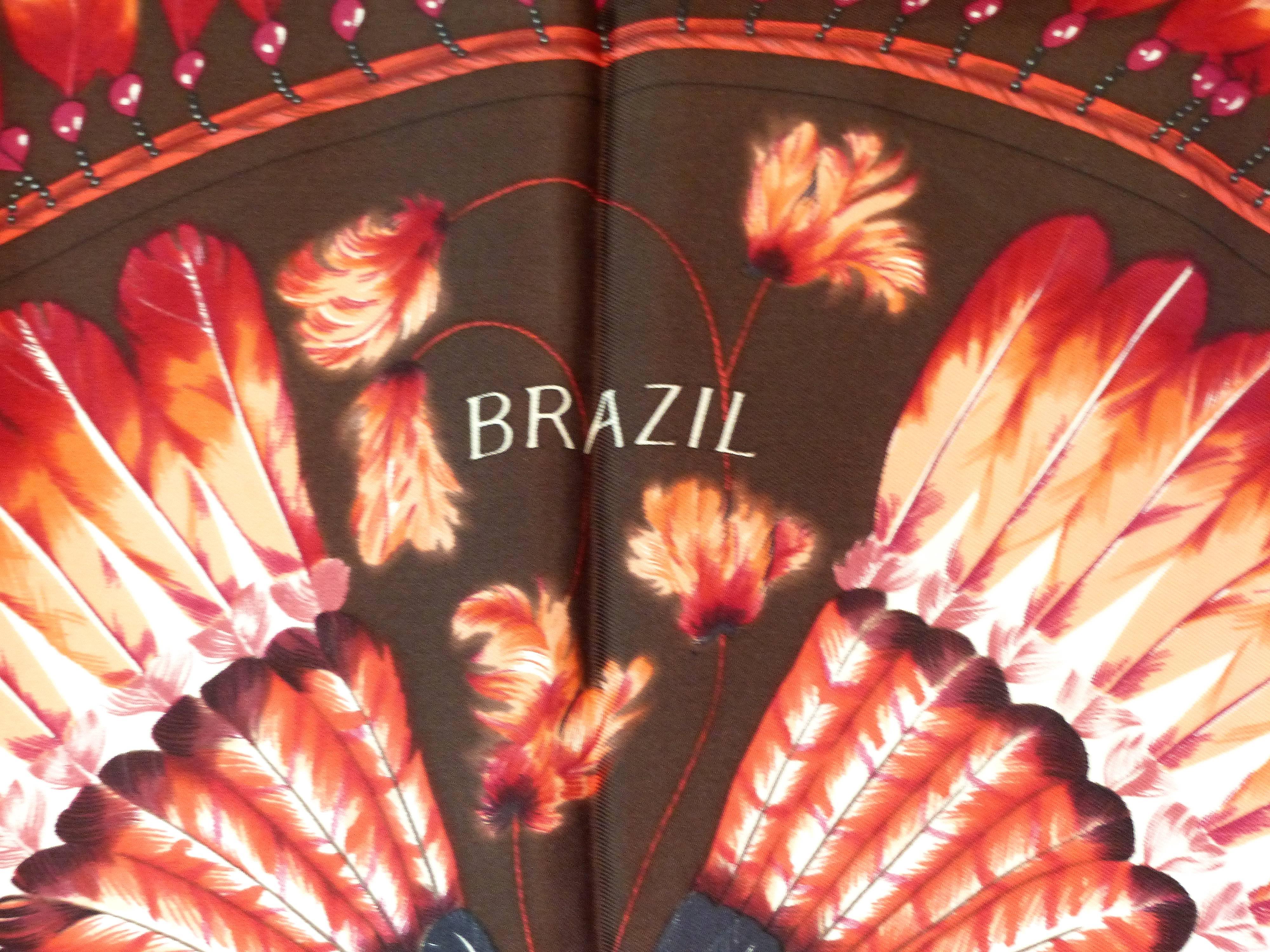 Offered for sale is a rich dark brown "Brazil" Hermes silk scarf designed by Laurence Bourthoumieux. The scarf retains the original folds and has rolled edges. Acquired from a collector and is unused.