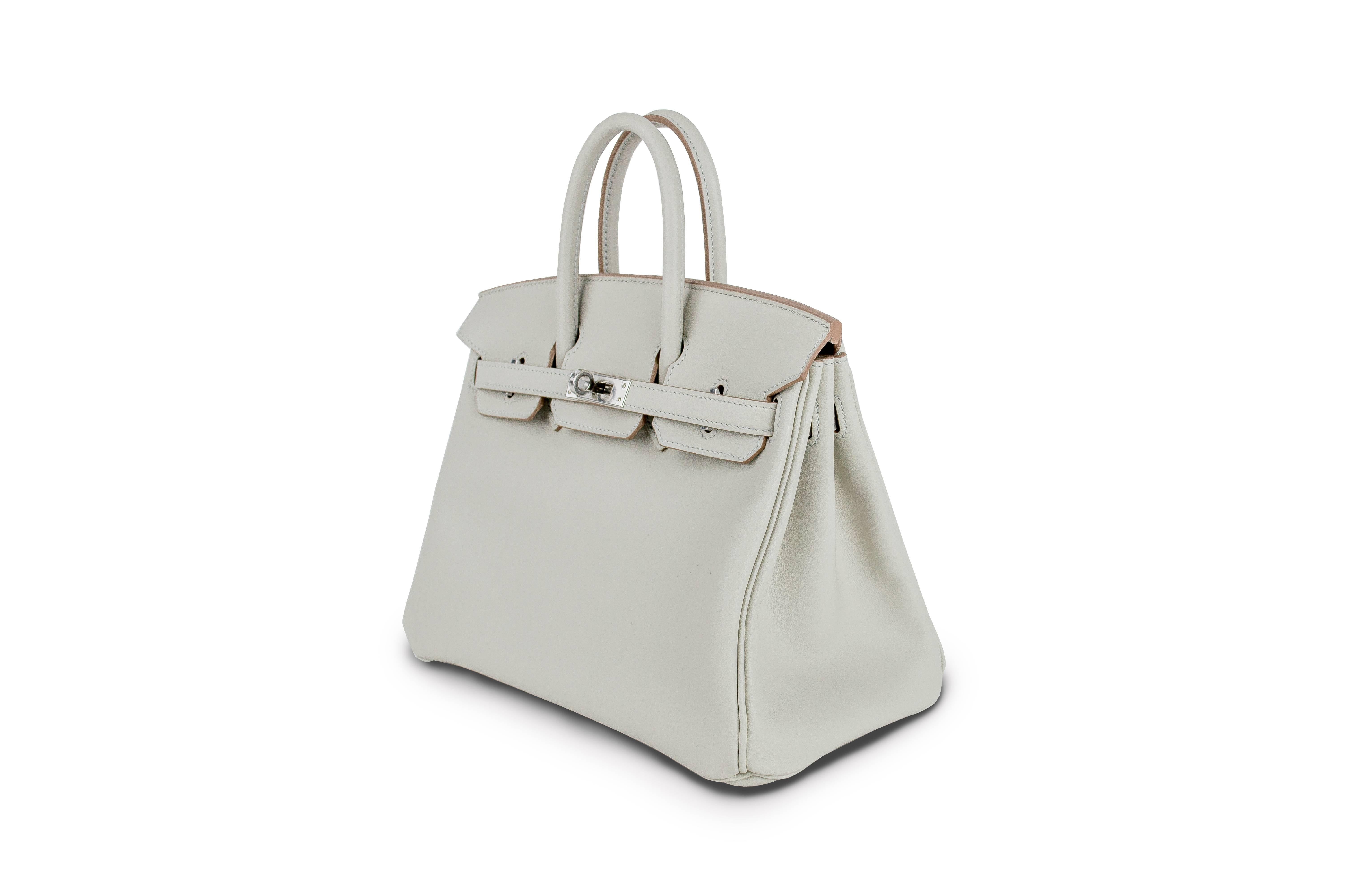 The new Hermès Birkin 25 cm Grey bag is a real masterpiece of the fashion industry. It is made of high quality leather and trimmed with silver accessories. Such handbag is a positional good emphasizing the irreproachable sense of style of its owner,