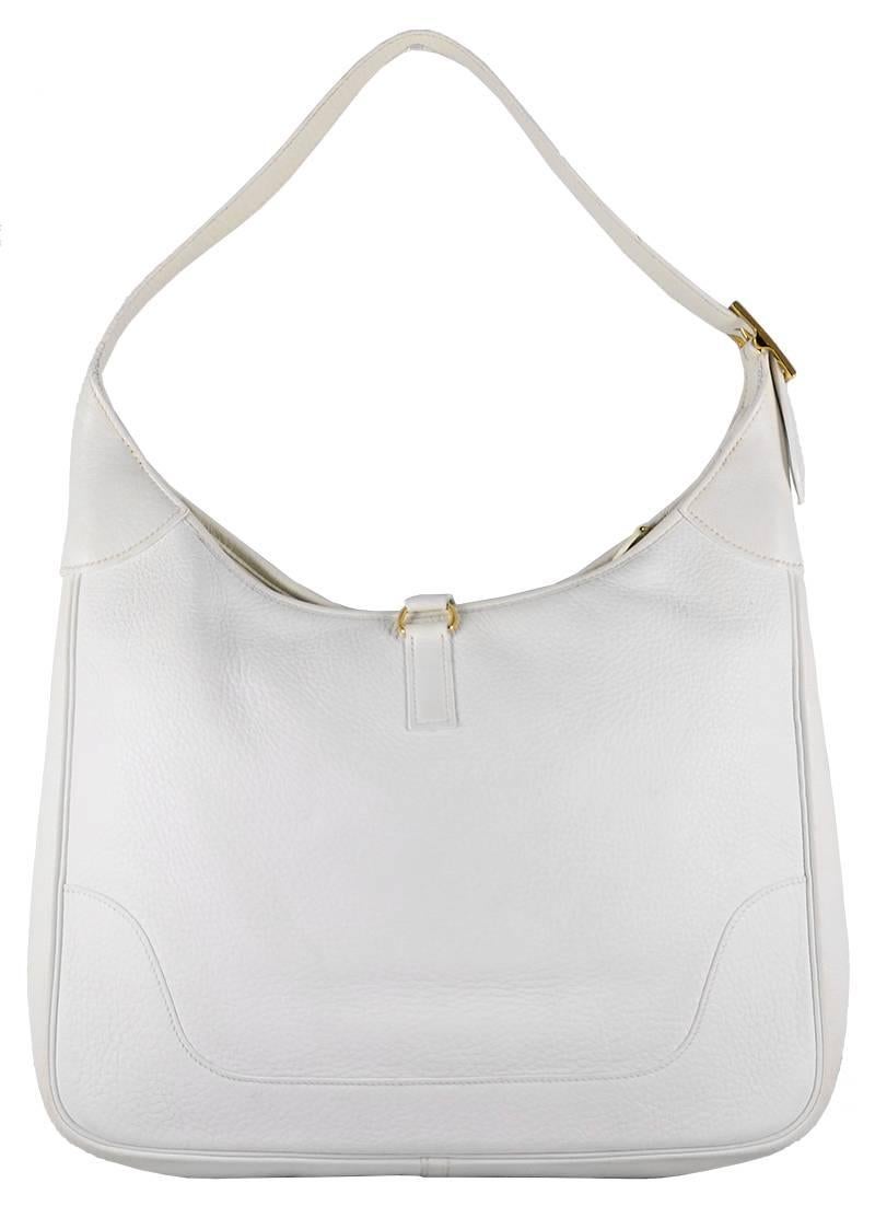 HERMES White Trim Bag with Gold Hardware
100% Authentic Hermes Trim Bag
COLOR: White
MATERIAL: Leather
HARDWARE: Gold Hardware
ORIGIN: France
CONDITION: Pristine
INCLUDES: Dustbag