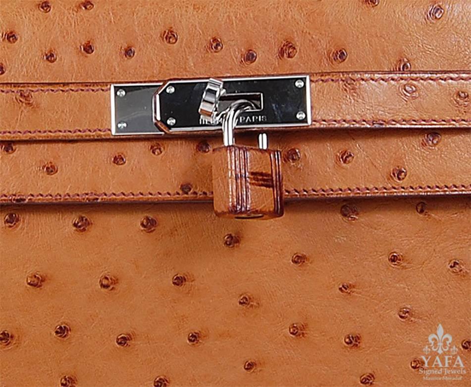 HERMES 32cm Tan Kelly Bag with Silver Hardware
100% Authentic Hermes Kelly Bag
COLOR: Tan
MATERIAL: Ostrich
HARDWARE: Silver
ORIGIN: France
CONDITION: Pristine
INCLUDES: Dustbag, lock, and key