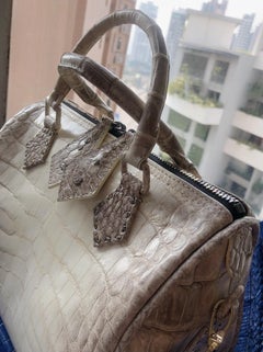 Ana Switzerland Crocodile duffel bag .