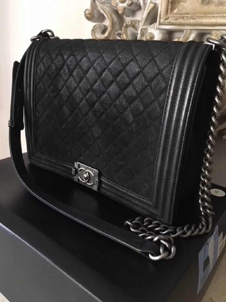 This Boy Bag has the quilted suede caviar leather . It is especially great for that fashionista that likes to carry more than just a purse. 
Please note the bag is brand new never worn . Different shades of the leather appear due to the suede as