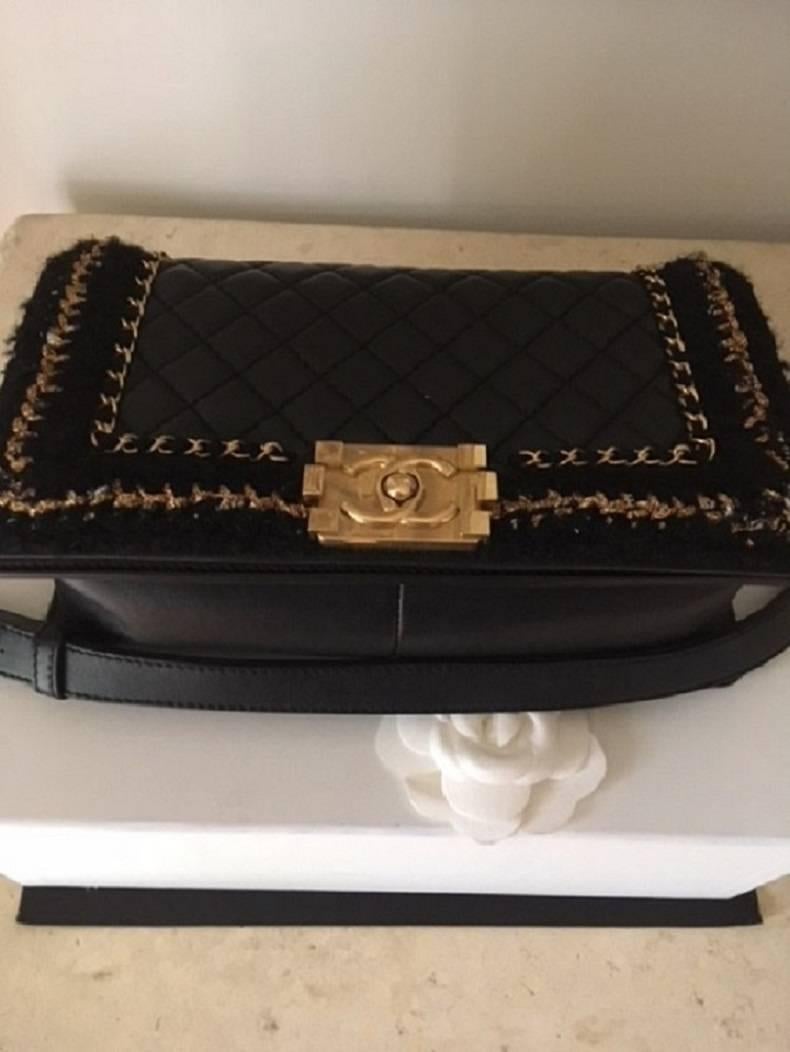  STORE FRESH 

Chanel Medium Tweed Boy Bag in Quilted Lambskin leather . This bag has the stunning soft supple quilted lambskin leather with the gold trim tweed edges . The bag has the gold chain hardware with the CC front lock closure. Internally