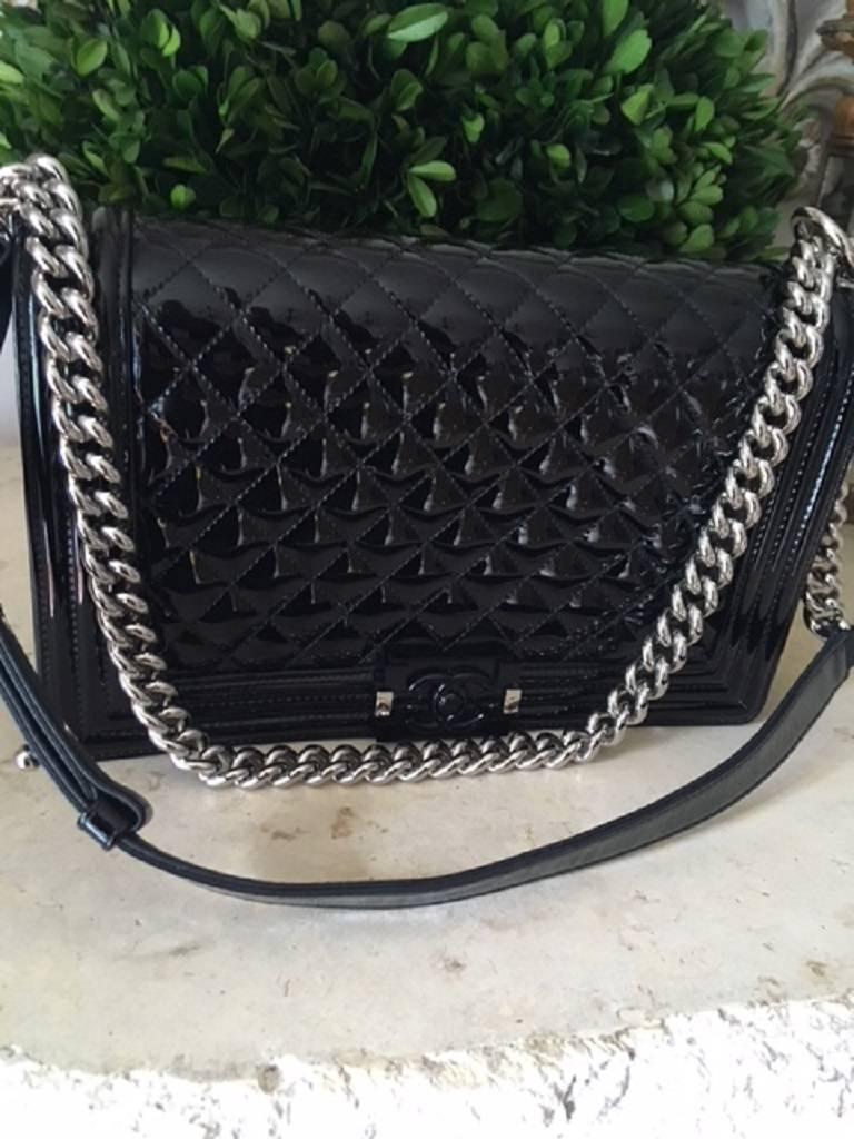 VERY INDIVIDUAL -  The best looking bag on the PLANET !!!  Store fresh 

If you are looking for an individual CHANEL then this is your bag. This bag is an absolute stunner .
BRAND NEW in box - NEVER WORN .  
This bag has the quilted patent leather