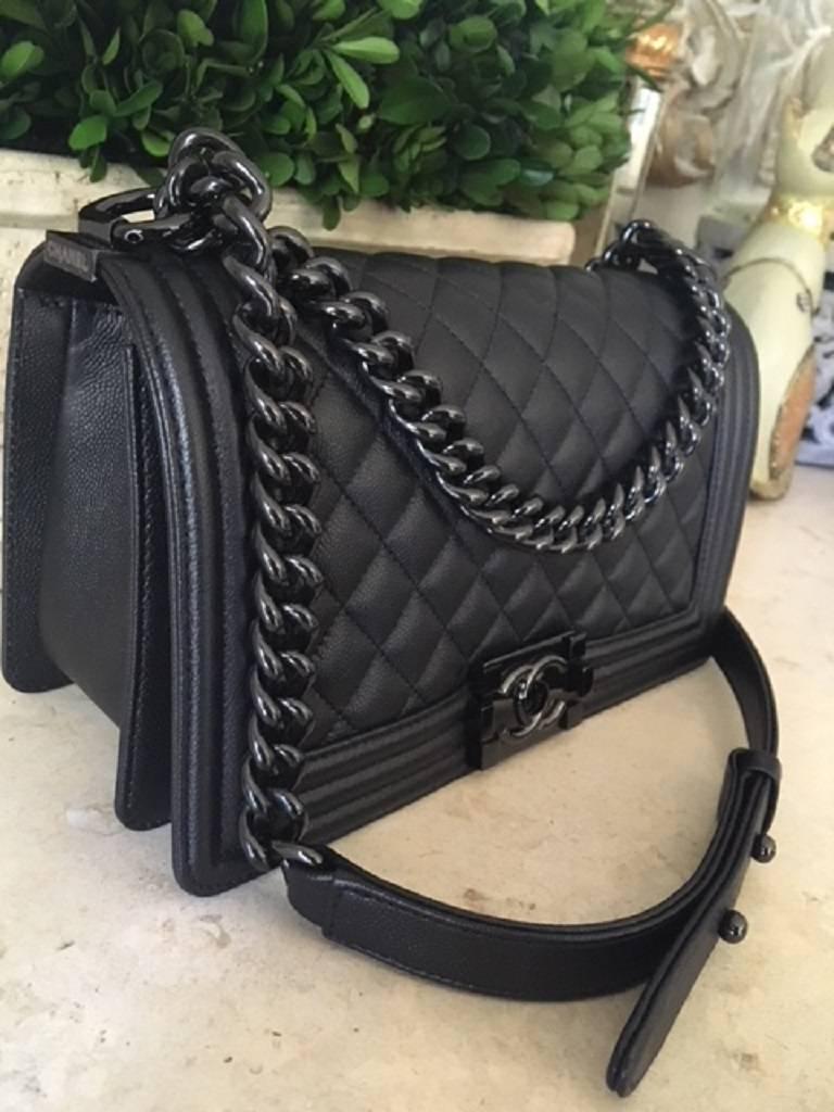 Brand New in Box with tags.  

 The Caviar Bag in this series is sold out worldwide . The old medium size. 
  Bag has the classy grain caviar leather with the so black CC push lock closure on the
  front and hardware. 
  The inside of the bag holds