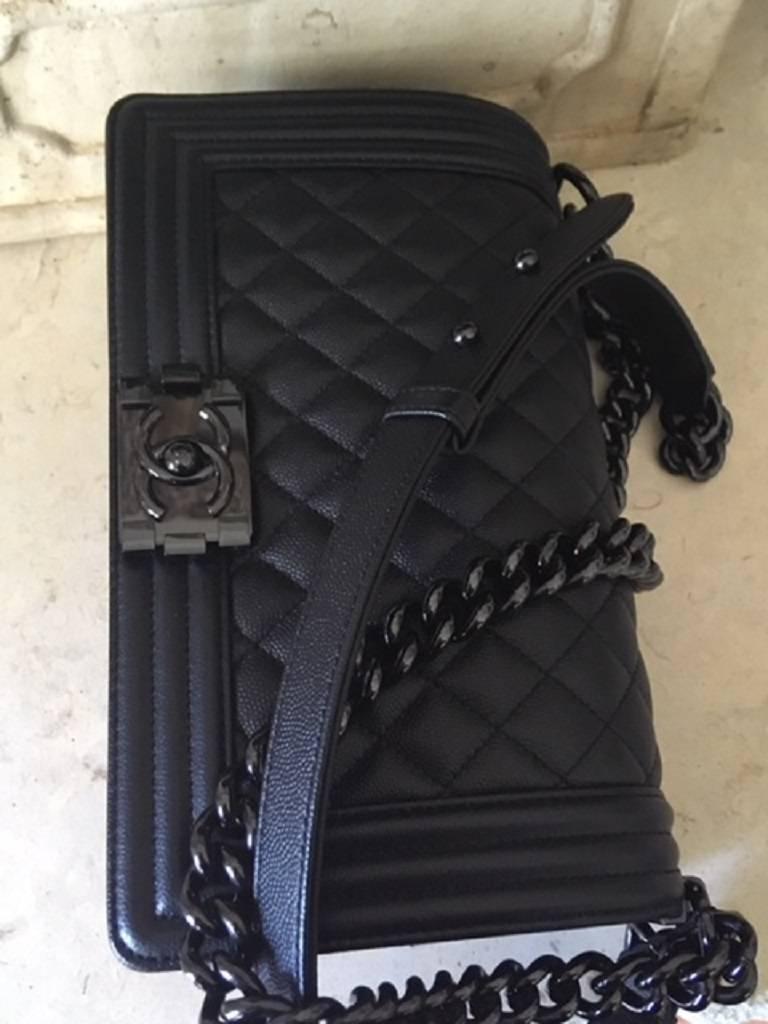 Chanel Medium SO black Boy Bag in quilted Caviar Leather . 1