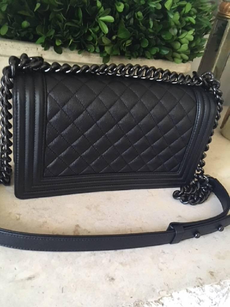 Chanel Medium SO black Boy Bag in quilted Caviar Leather . 3