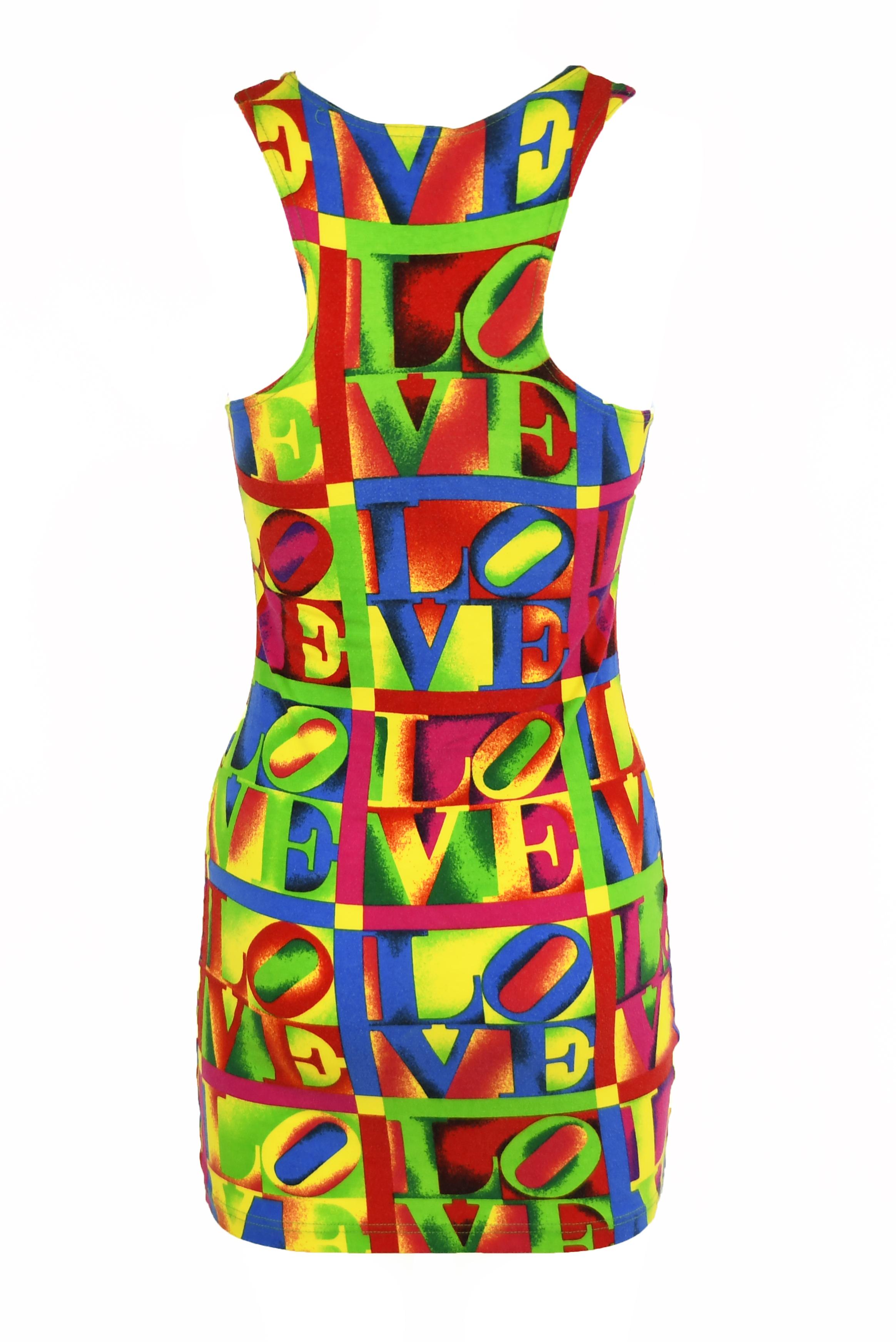 Rare vintage Versace jersey knit mini dress in bright multicolored LOVE print.  Racer back top and fitted silhouette in the coveted 90s LOVE pattern.  Highly collectible piece from Versace's 1995 S/S collection.

Size: IT 44, could fit smaller sizes