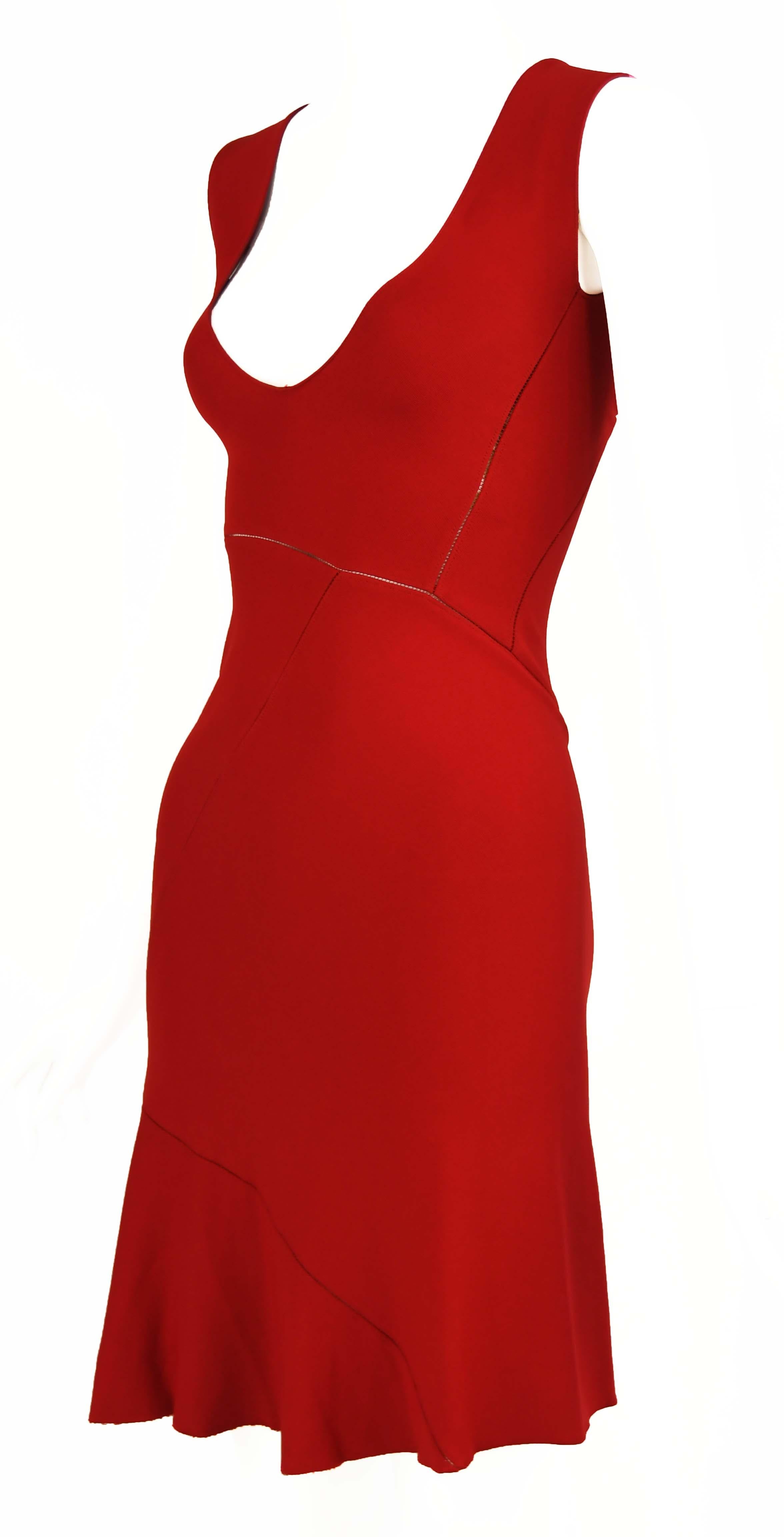 Sleeveless, vintage Alaia red dress featuring asymmetrical seams with a slight peak-a-boo effect.  Sexy v neck and fitted through the bodice.

Size: Size not marked but approximate small

Condition: Excellent vintage condition

Composition: Missing