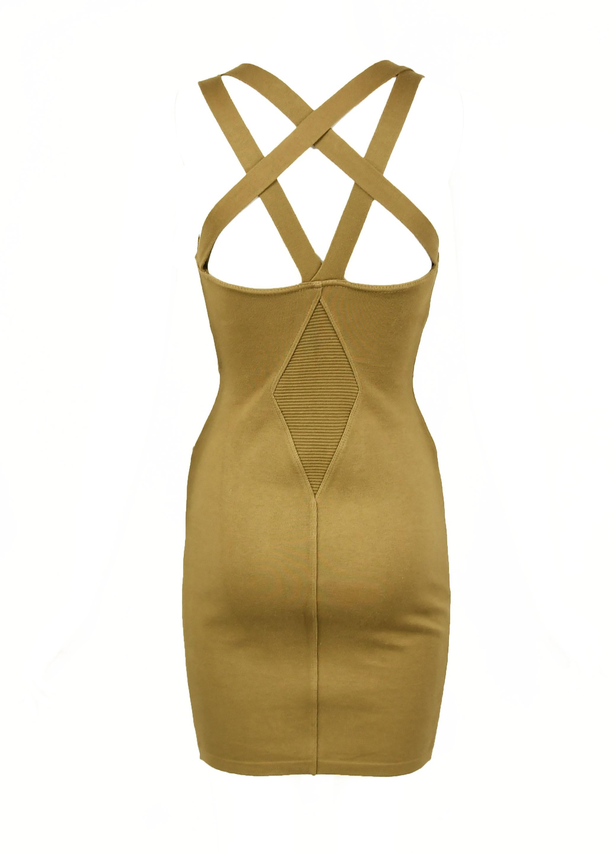 Sexy vintage Alaia dress made out of a khaki colored knit with ribbed knit inserts and a strappy back.  Perfect outfit for a date or a night out on the town.  Coveted vintage collection by Azzedine Alaia.

Size: M

Condition: Excellent vintage