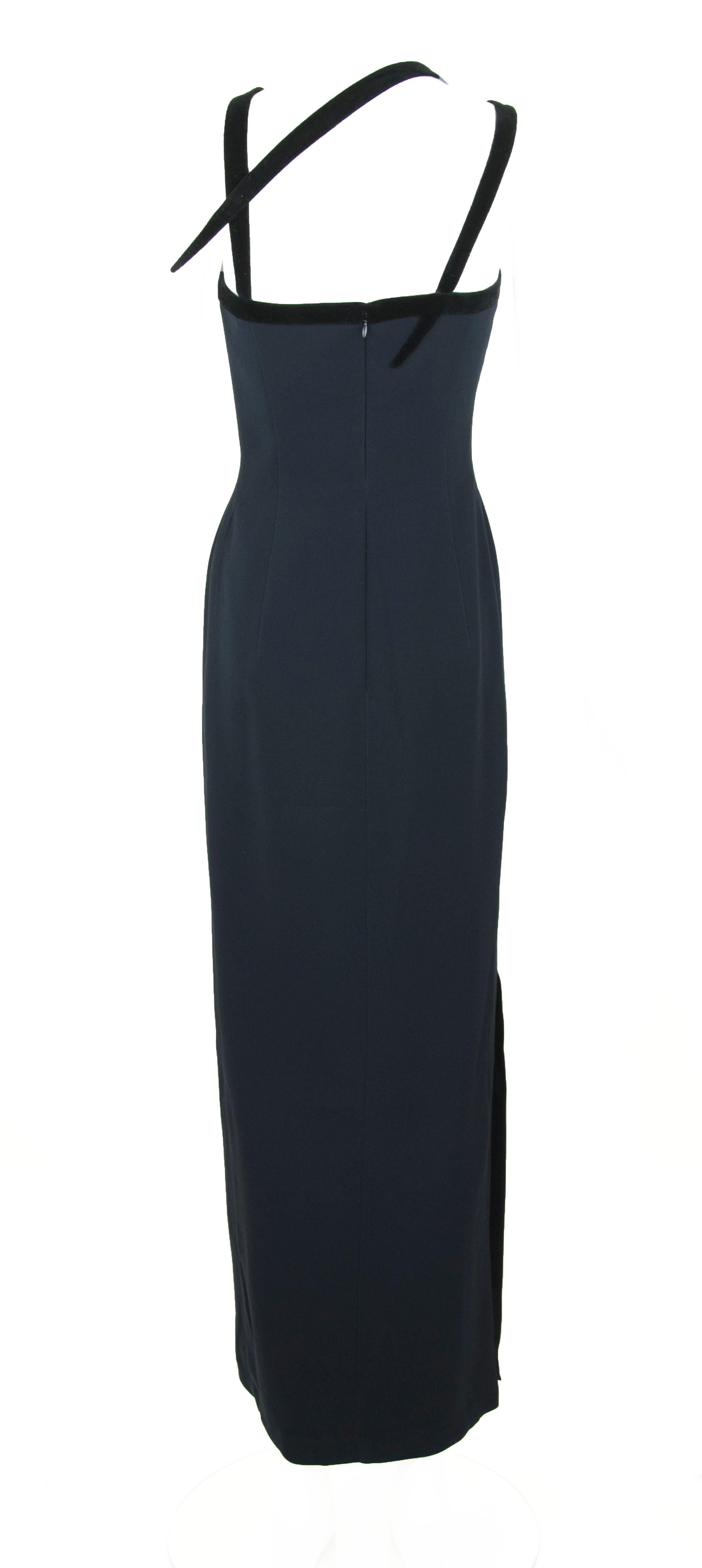 Gorgeous Thierry Mugler navy blue silk gown, perfect for your next black tie event.  Geometric and asymmetrical black velvet straps add interesting detail to this dress.  

Size: FR 36

Condition: New with tags

Care: Dry clean only

Made in France