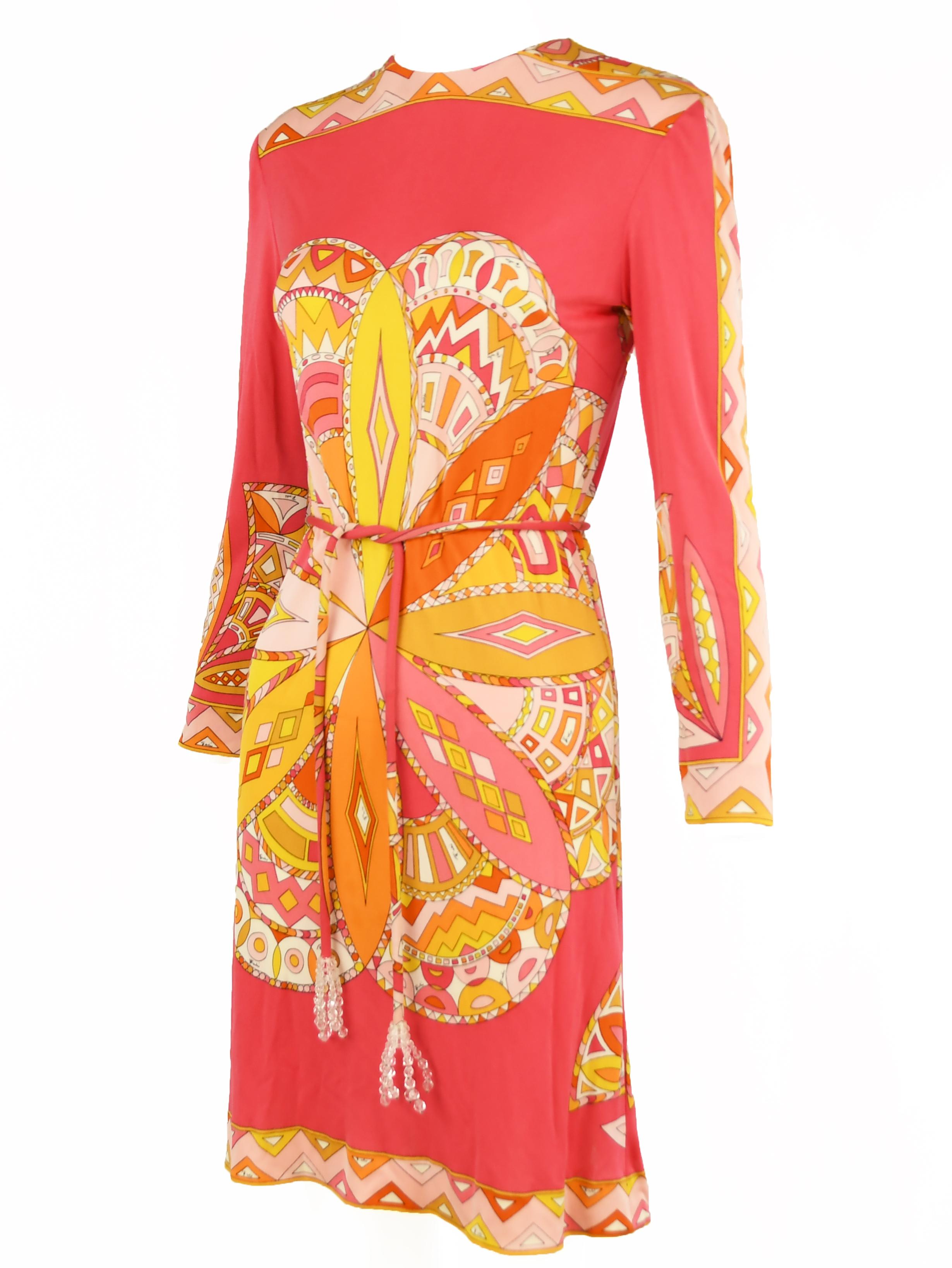 One of a kind vintage Pucci three quarter sleeve dress in stunning coral, yellow and orange.  Optional belt has clear bead tassels at the end.  In excellent vintage condition.  Vintage Pucci tag reads size 12, which converts to approximately a