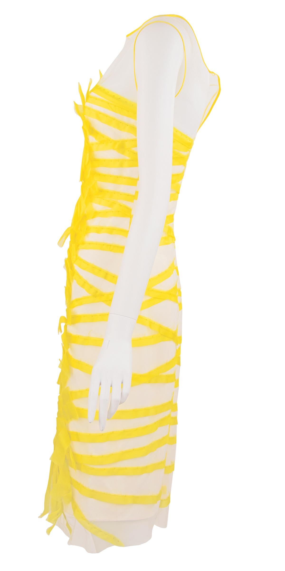 Absolutely gorgeous white tulle dress with yellow bias strip design, by renowned evening wear designer, Angel Sanchez.  Perfect dress for a spring or summer cocktail party.  

Size: US 2

Condition: New with tags

Composition: 100% silk

Made in the