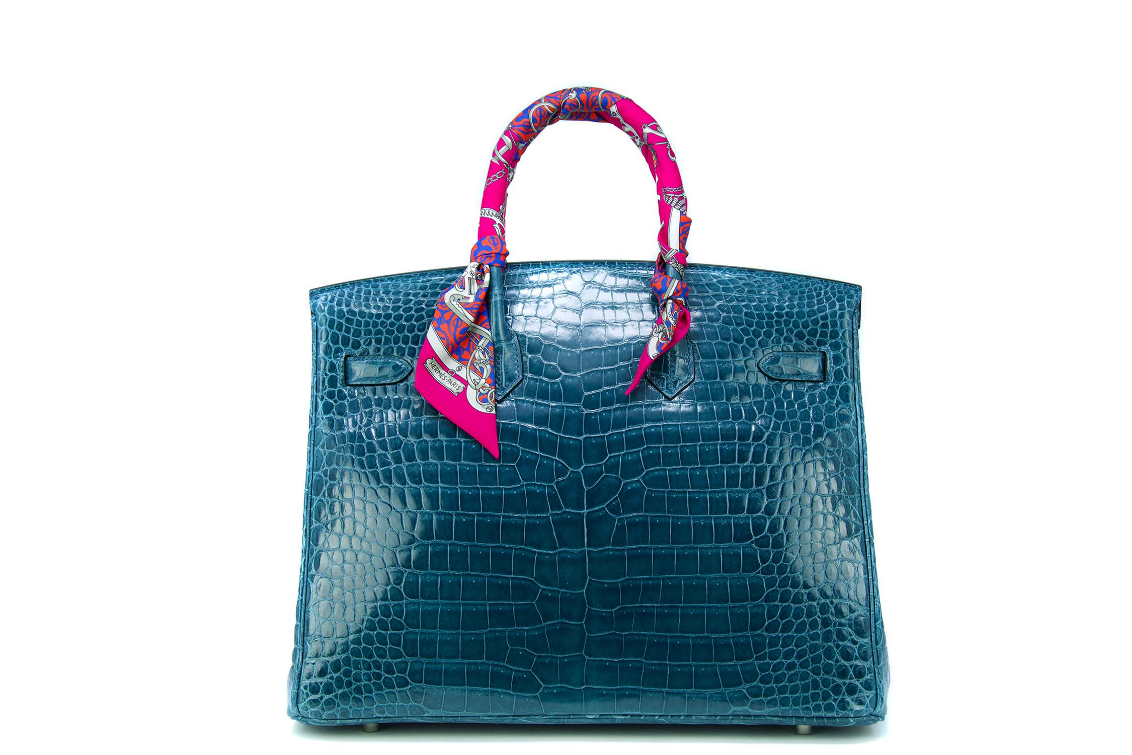 Bleu colvert crocodile porosus Hermes 35 Birkin with palladium hardware. Extremely rare deep turquoise color which has hints of both green and blue.  New with plastic on the hardware.  Comes with Hermes box, dustcover, rain jacket and clochette.  