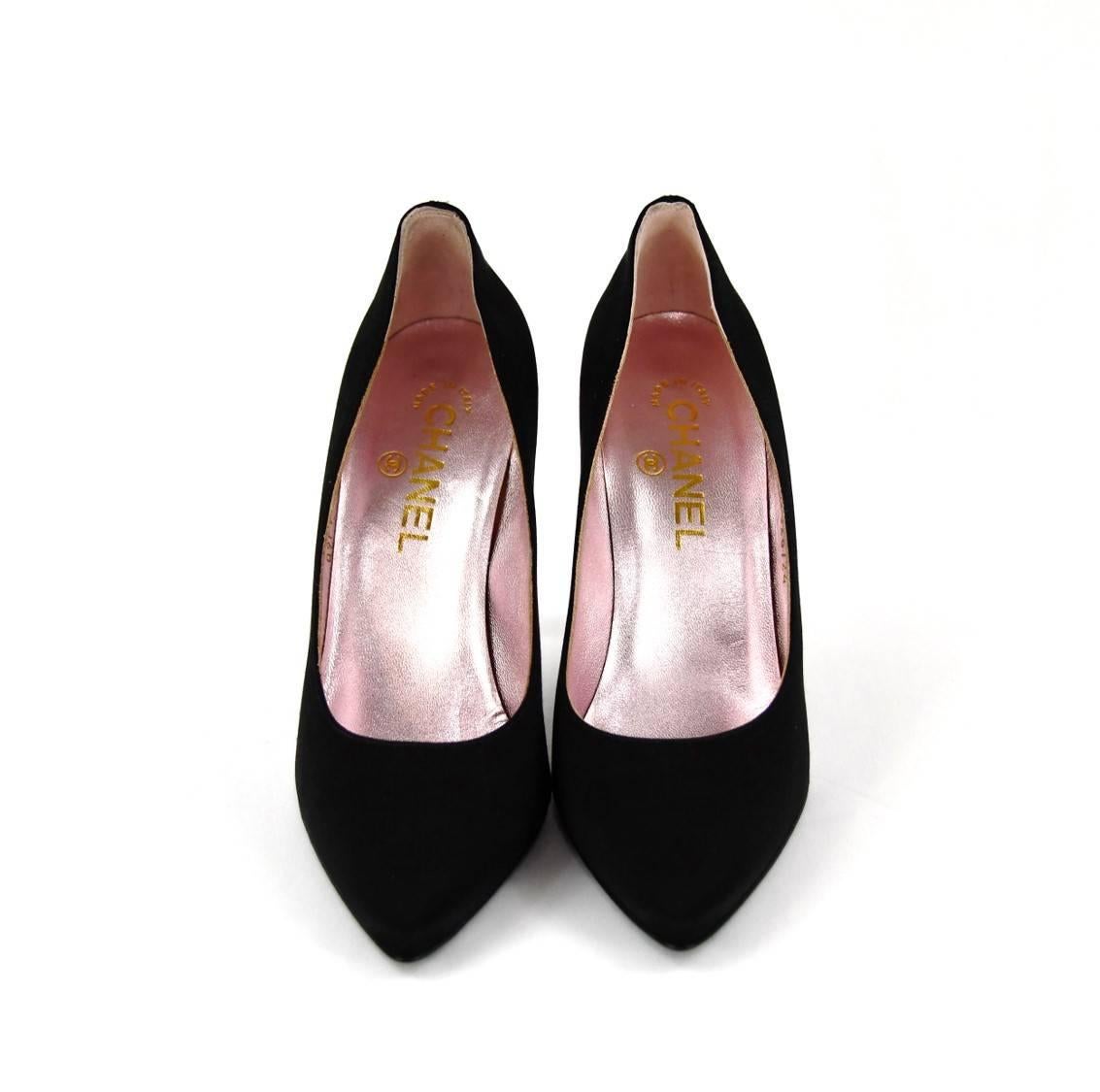 Beautiful Chanel black satin pumps with gradient lucite 4 inch heels.  Never been worn. Womens Size 37.
Two dusters and original box.  