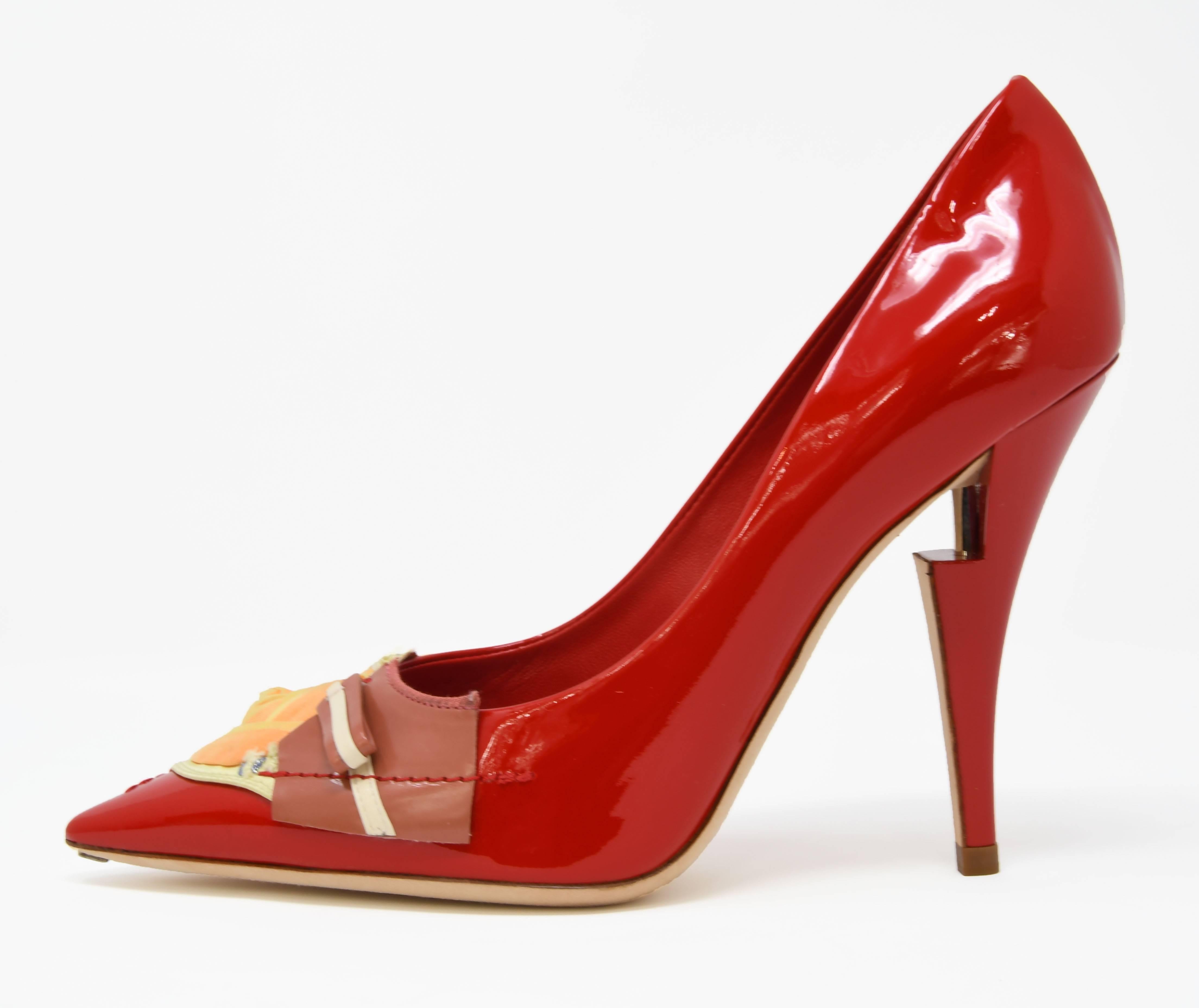 Louis Vuitton French Riviera Red (Rouge) Patent Leather Pumps Womens Size 37.  Patchwork montage on vamp with fabric rose and patent leather pieces; embroidered sequin and bead detailing.  Features smooth grained leather lining and padded insole